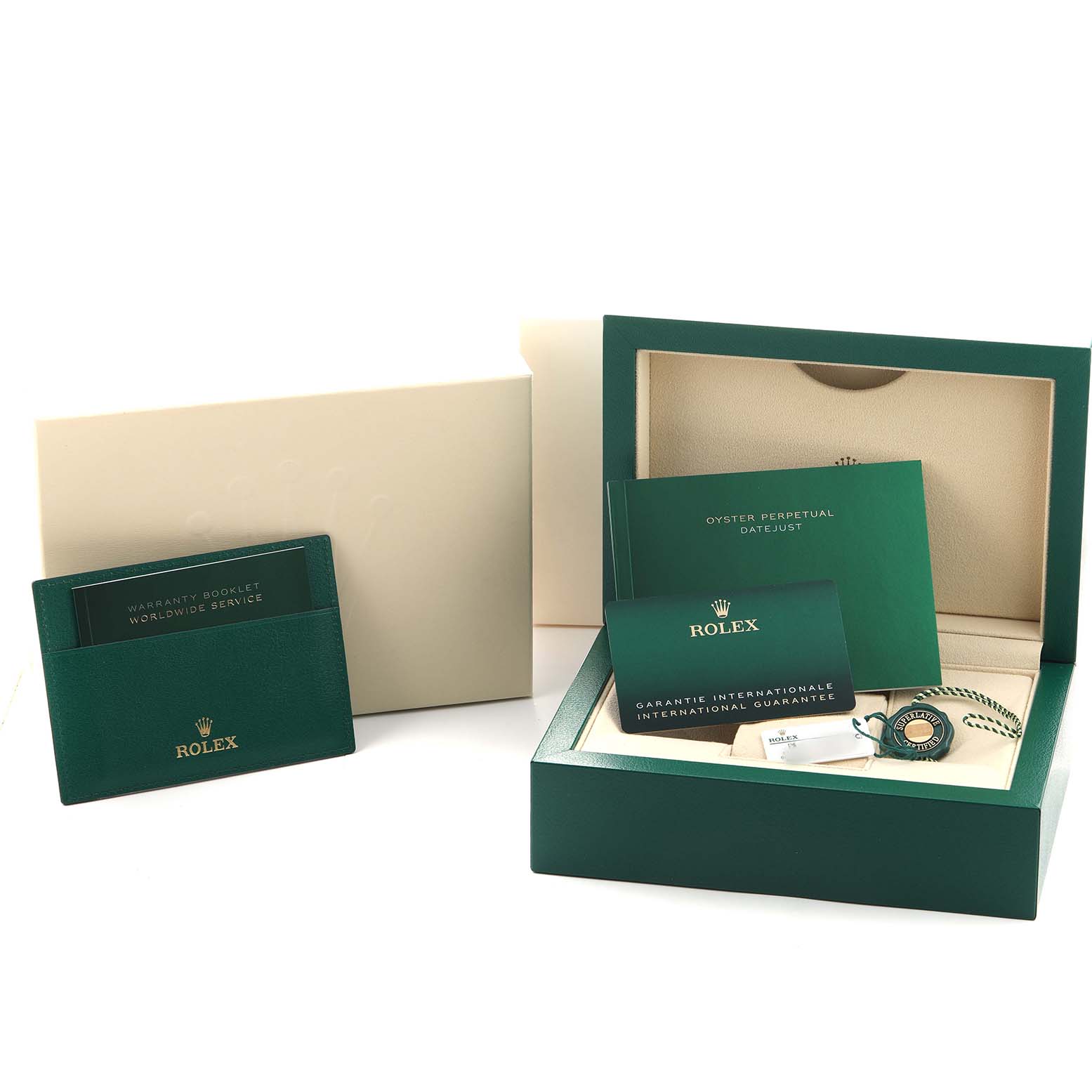 The image shows a Rolex Datejust 41 126334 Men's Stainless Steel Blue Dial box set with warranty booklets, tags, and a green and beige case from an angled view.
