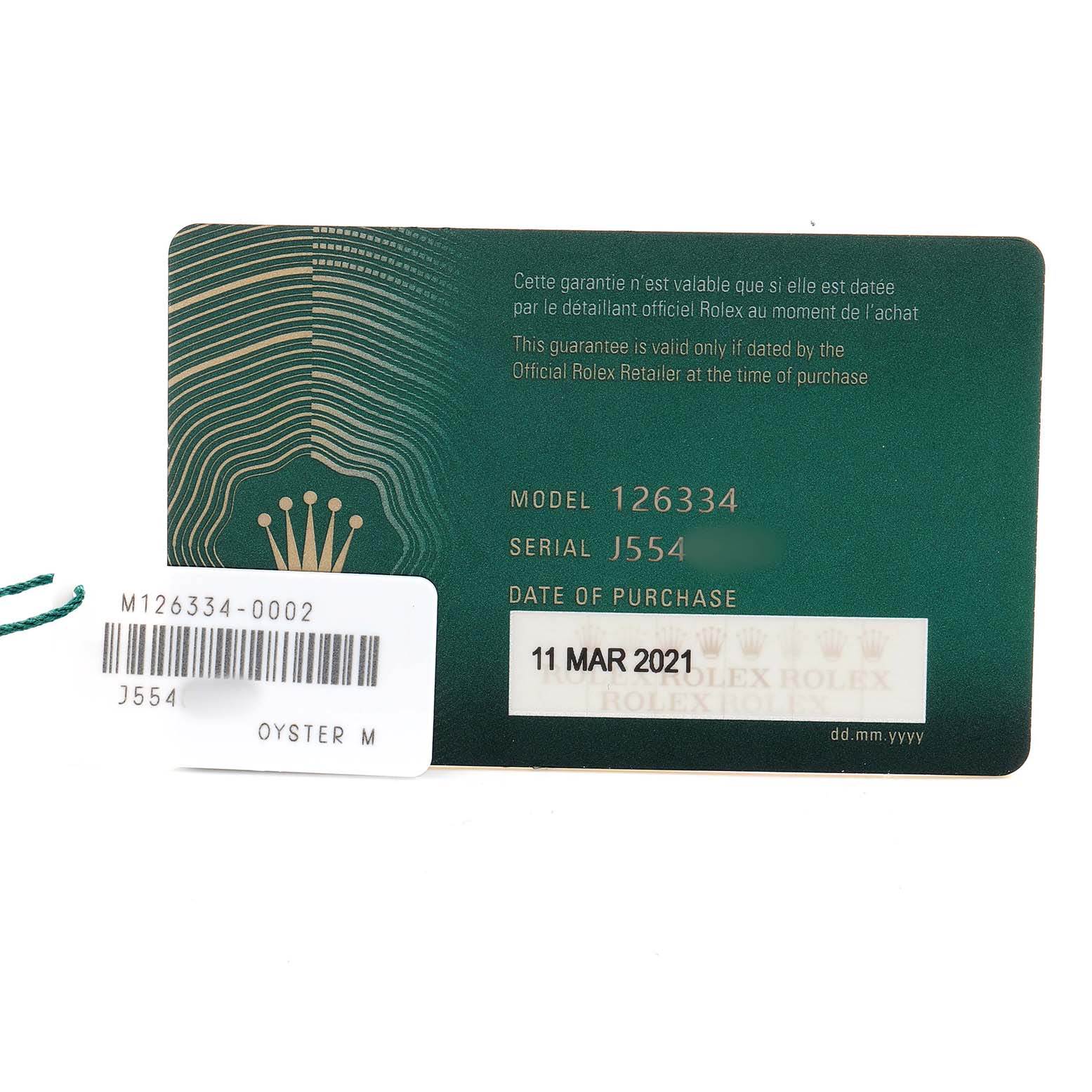 The image shows a warranty card and tag for a Rolex Datejust 41 126334 Men's Stainless Steel Blue Dial model, displaying the model and serial numbers.