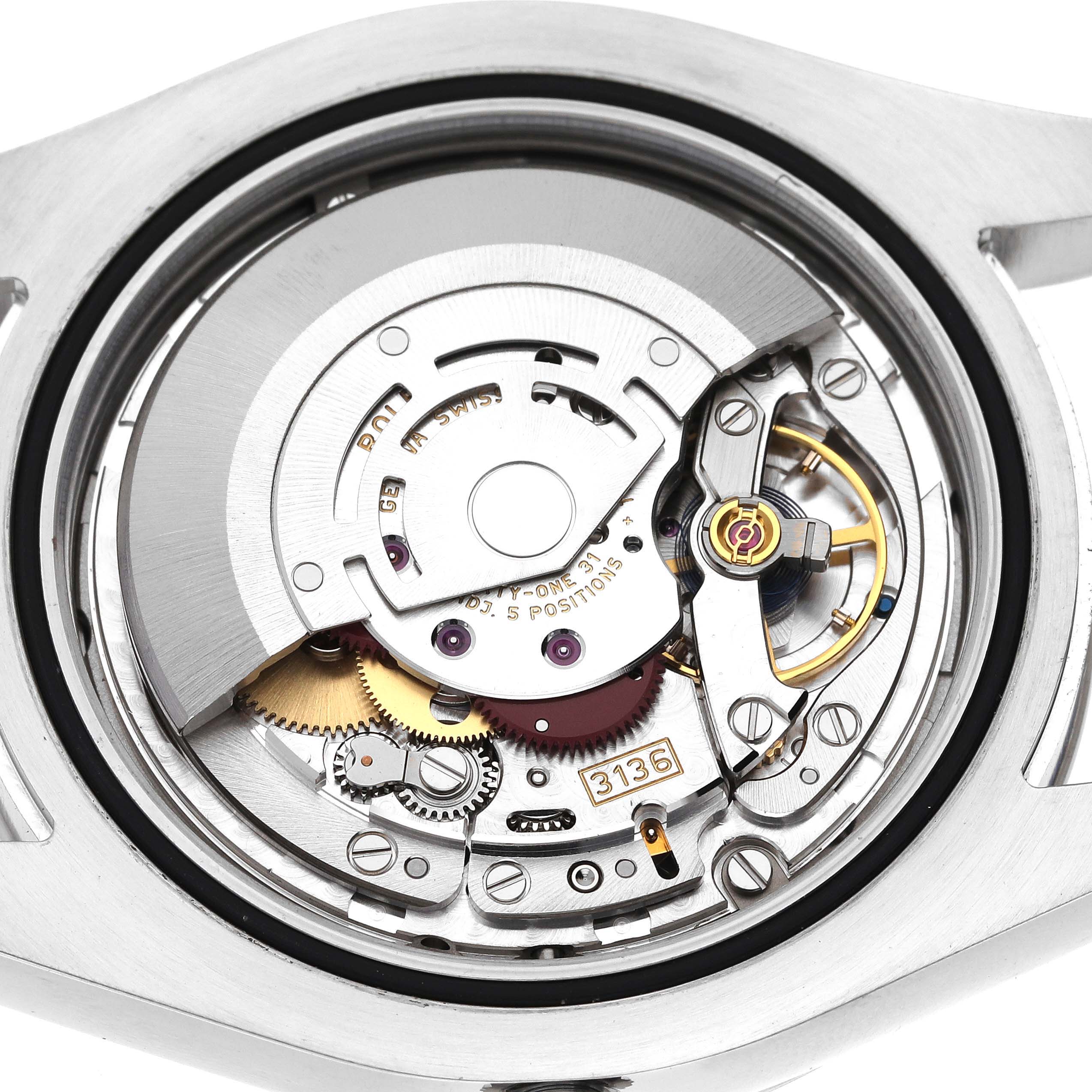 The image shows the movement of a Rolex Datejust 41 116334 Men
s Stainless Steel Black Dial 116334 Men
s Stainless Steel Black Dial from a rear angle, highlighting its intricate mechanical components.