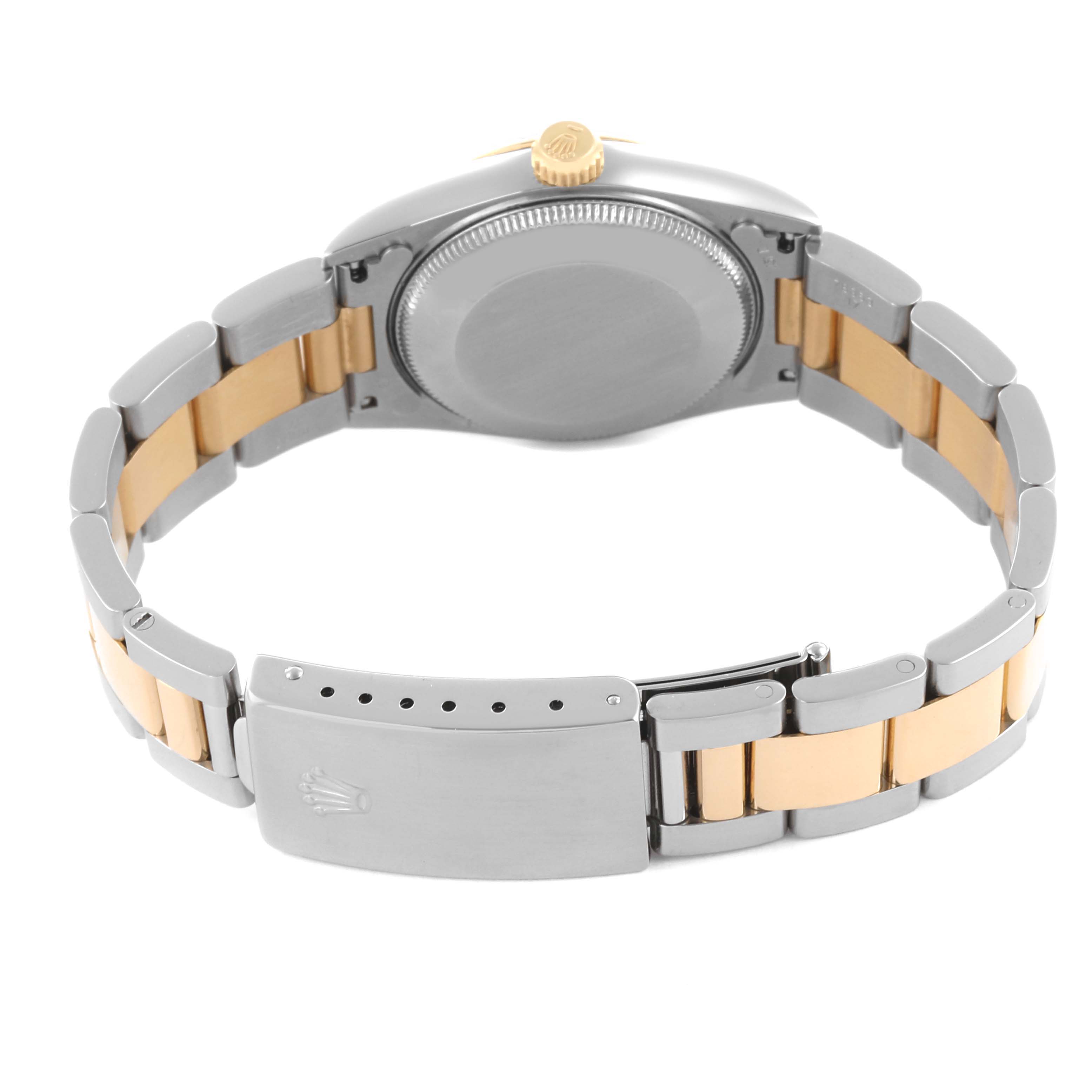 The Mid-Size Rolex watch is shown from the back, displaying the clasp, bracelet, and case back.