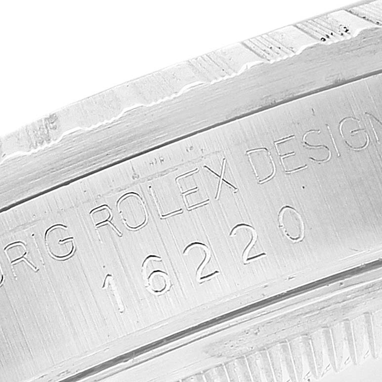 The image shows a close-up of the case side with engraving on the Rolex Datejust 16220 Men's Stainless Steel Silver Dial 16220 Men's Stainless Steel Silver Dial model.