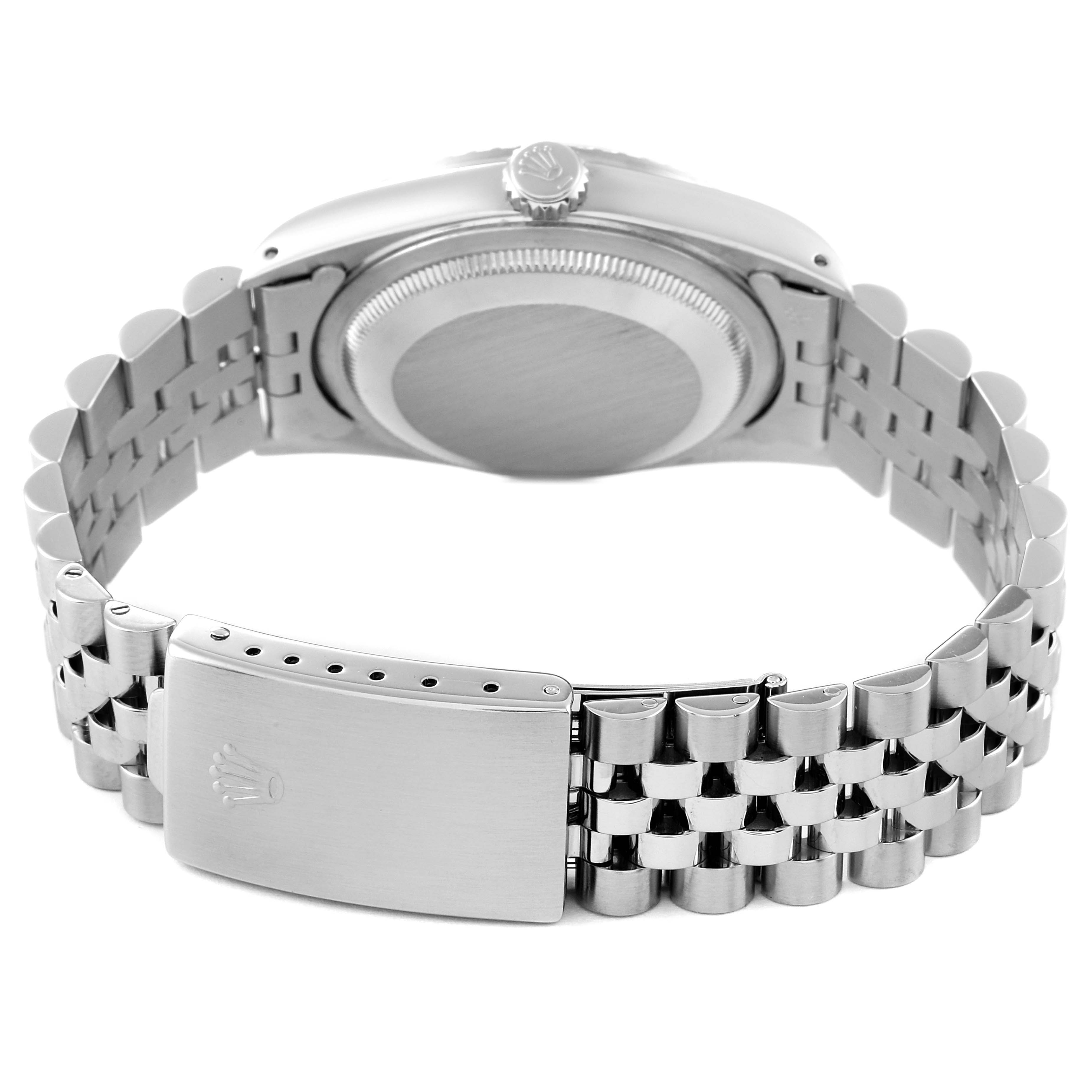 This image shows the back view of a Rolex Datejust 16220 Men's Stainless Steel Silver Dial 16220 Men's Stainless Steel Silver Dial watch, highlighting the case back, crown, and metal bracelet.