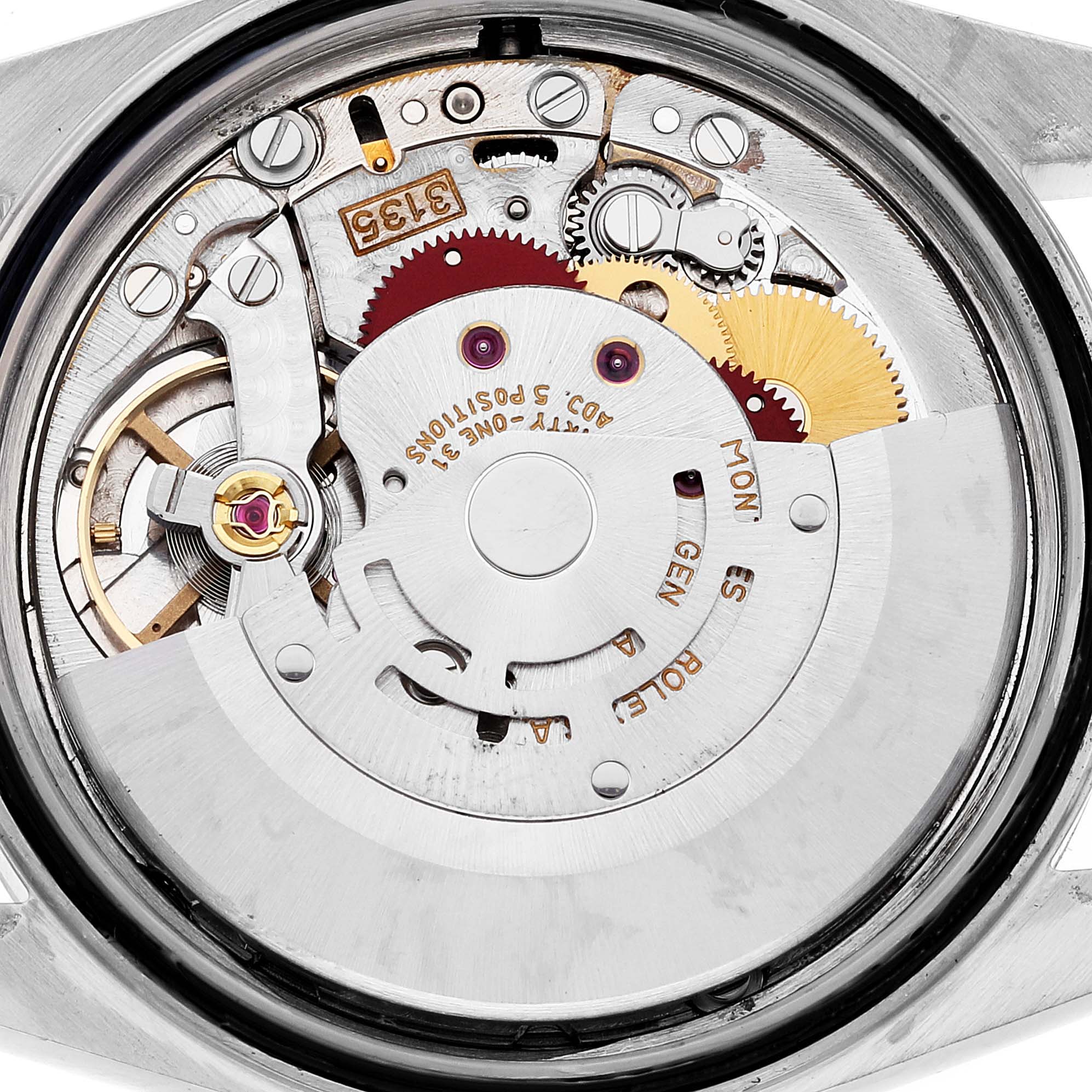 The image shows the back view of the Rolex Datejust 16220 Men's Stainless Steel Silver Dial 16220 Men's Stainless Steel Silver Dial watch, revealing the intricate mechanical movement inside.