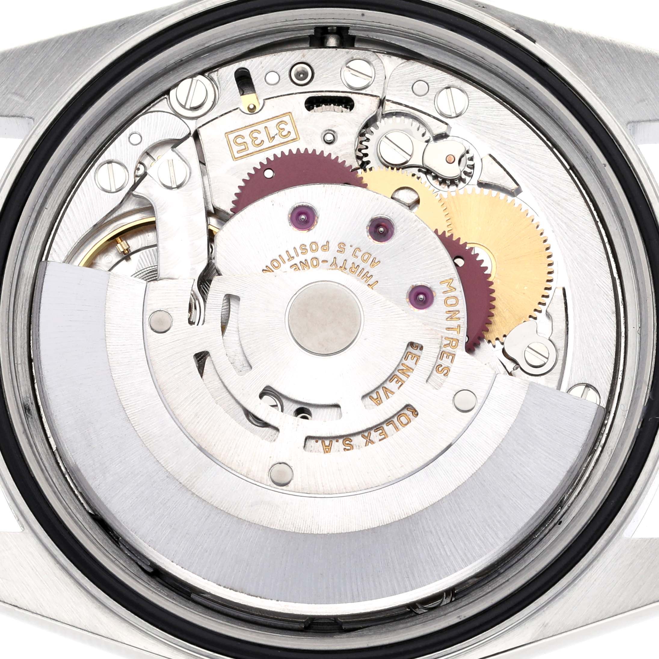 The image shows the movement mechanism of a Rolex Datejust 16200 Men's Stainless Steel Silver Dial watch from the back.