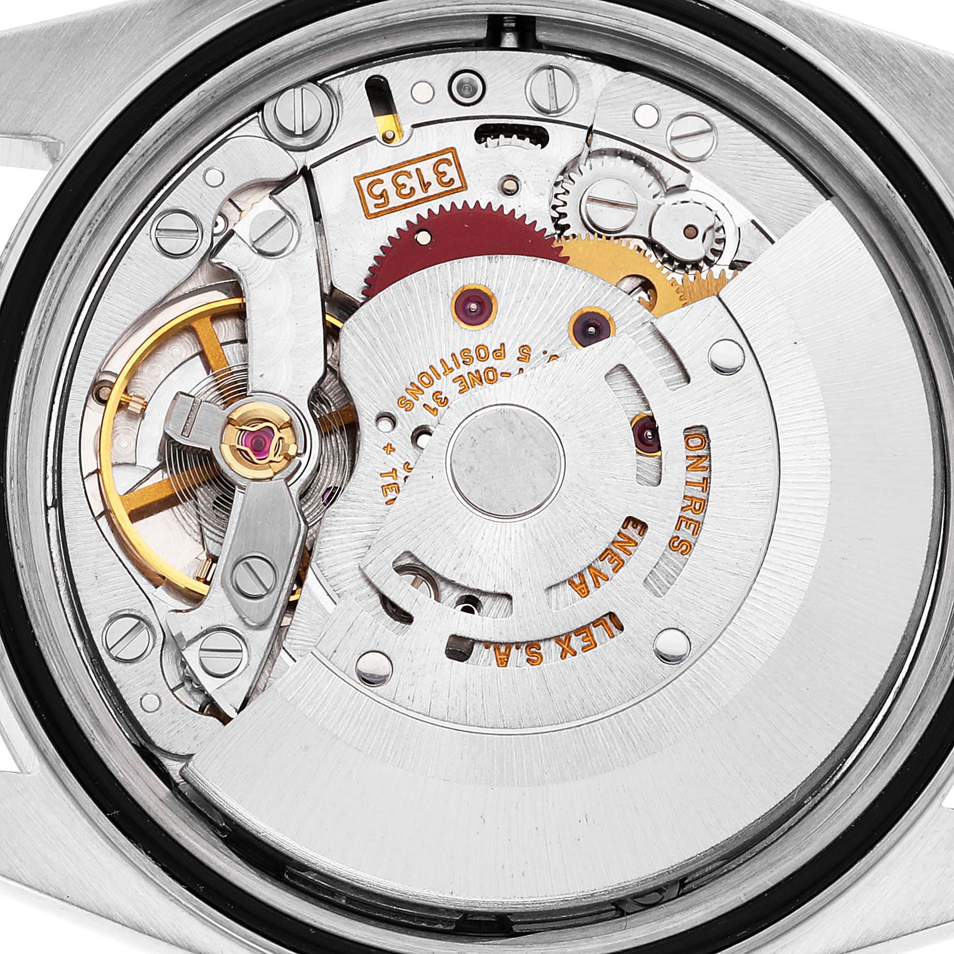 This image shows the inner mechanical movement of the Rolex Datejust 16233 Men's Steel and Gold (two tone) White Dial 16233 Men's Steel and Gold (two tone) White Dial watch with visible gears and components.