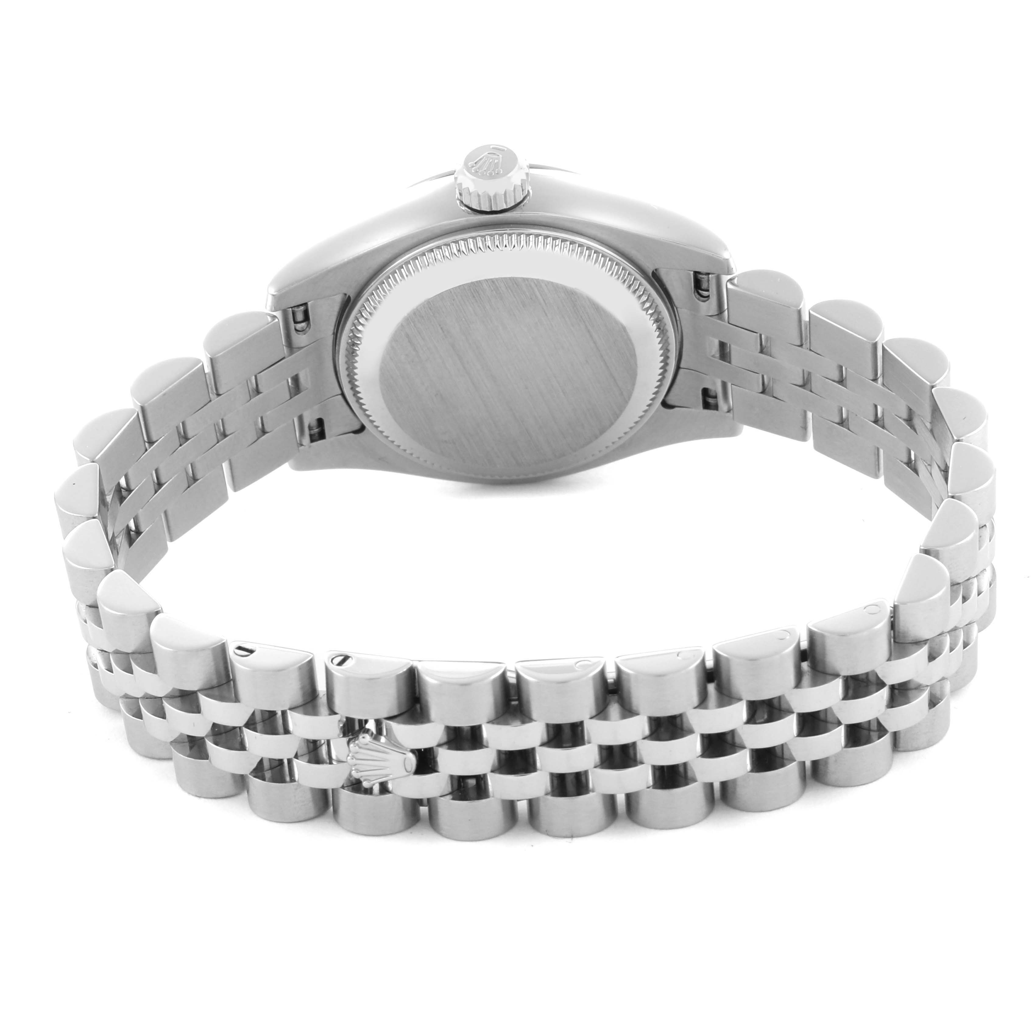 The Rolex Datejust 179174 Women
s Stainless Steel Black Dial 179174 Women
s Stainless Steel Black Dial watch is shown from the back, highlighting the case back and stainless steel bracelet.