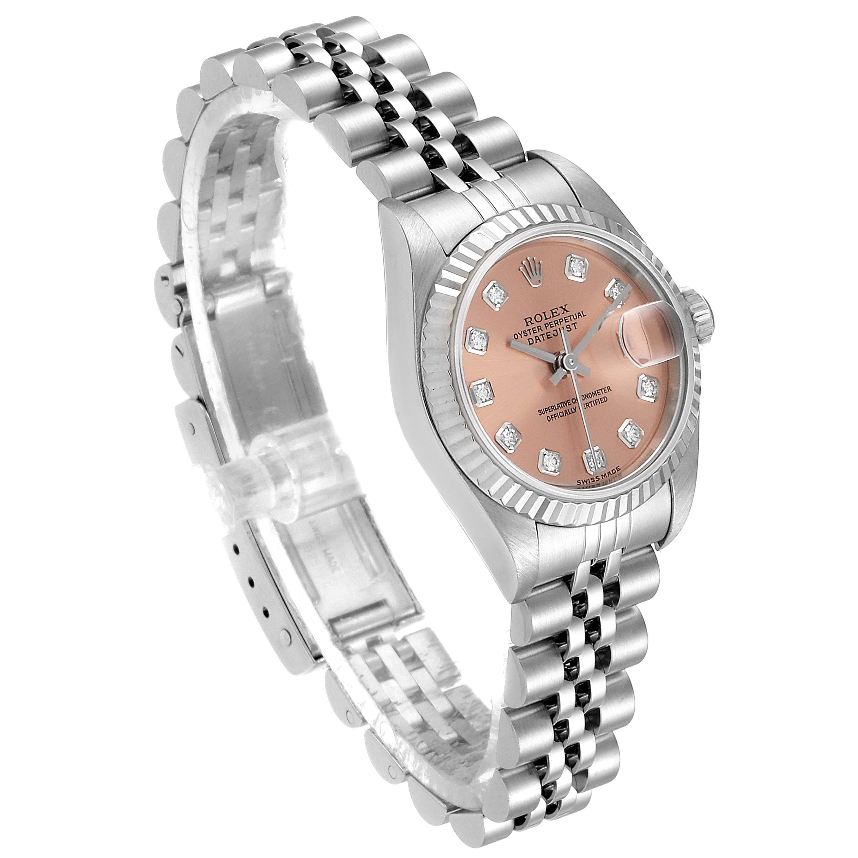 This image shows a Rolex Datejust 79174 Women
s Stainless Steel Pink Dial 79174 Women
s Stainless Steel Pink Dial watch at an angled perspective, displaying its strap, case, dial, and crown.