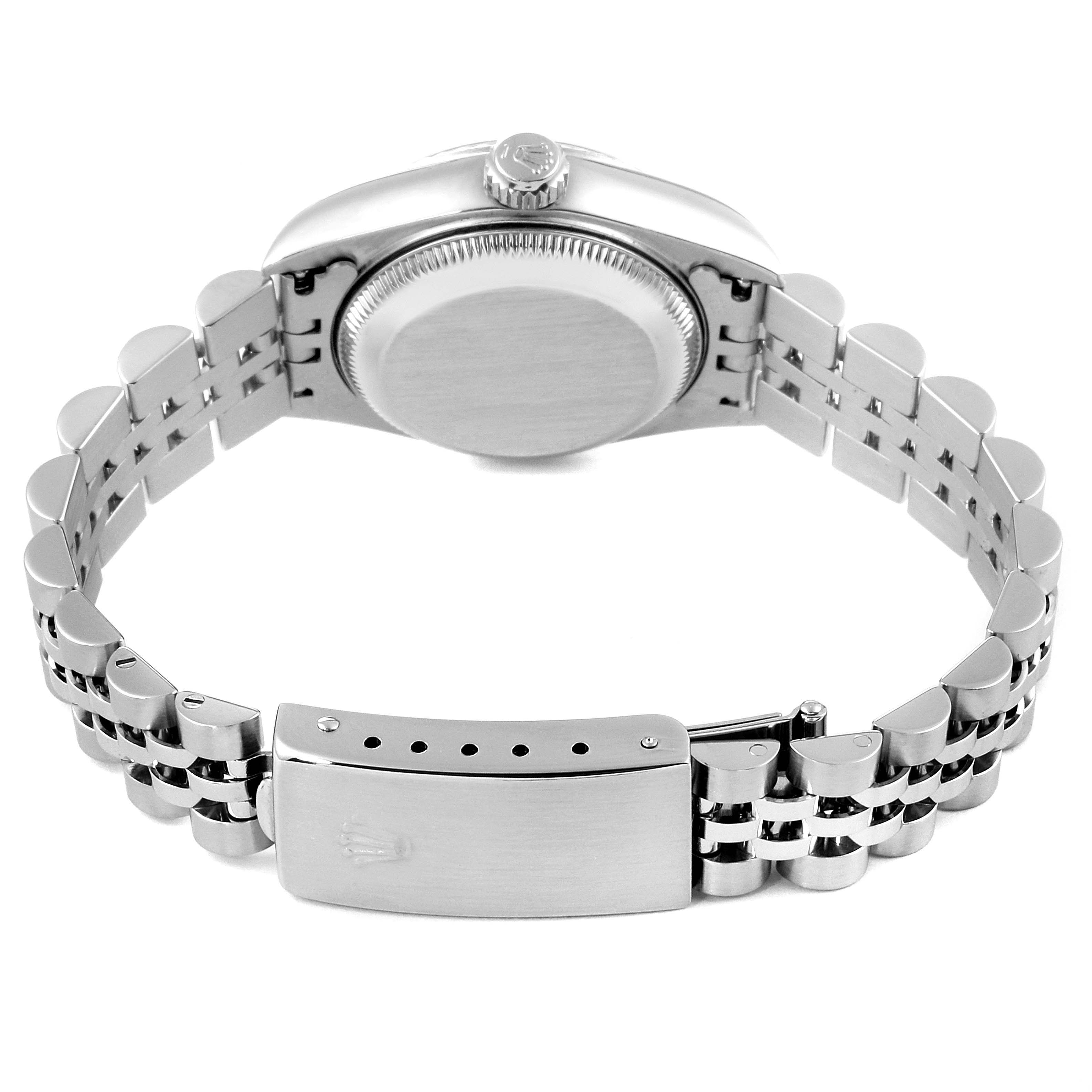 The image shows the backside and bracelet of a Rolex Datejust 79174 Women
s Stainless Steel Pink Dial 79174 Women
s Stainless Steel Pink Dial watch, highlighting the caseback and clasp.