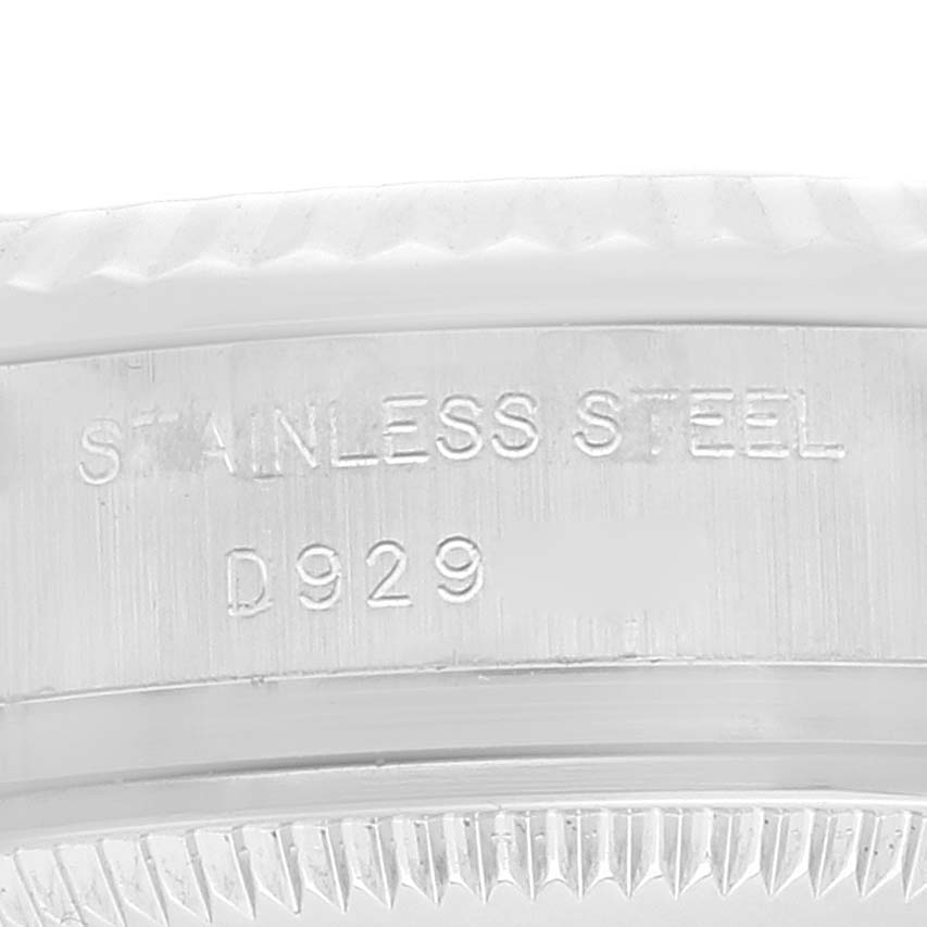 The image shows a close-up of the bezel and case side of a Rolex Datejust 179174 Women's Stainless Steel Silver Dial 179174 Women's Stainless Steel Silver Dial watch, highlighting the "STAINLESS STEEL" engraving.