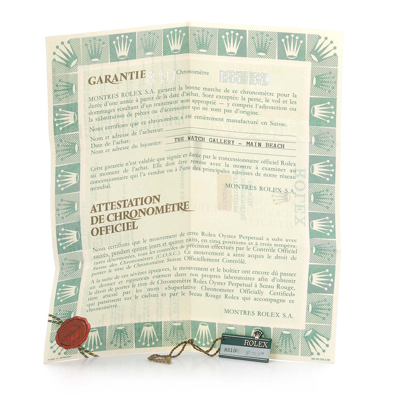 The image shows warranty and certification papers for a Rolex Datejust 16233 Men
s Steel and Gold (two tone) Champagne Dial 16233 Men
s Steel and Gold (two tone) Champagne Dial model, along with a tag.