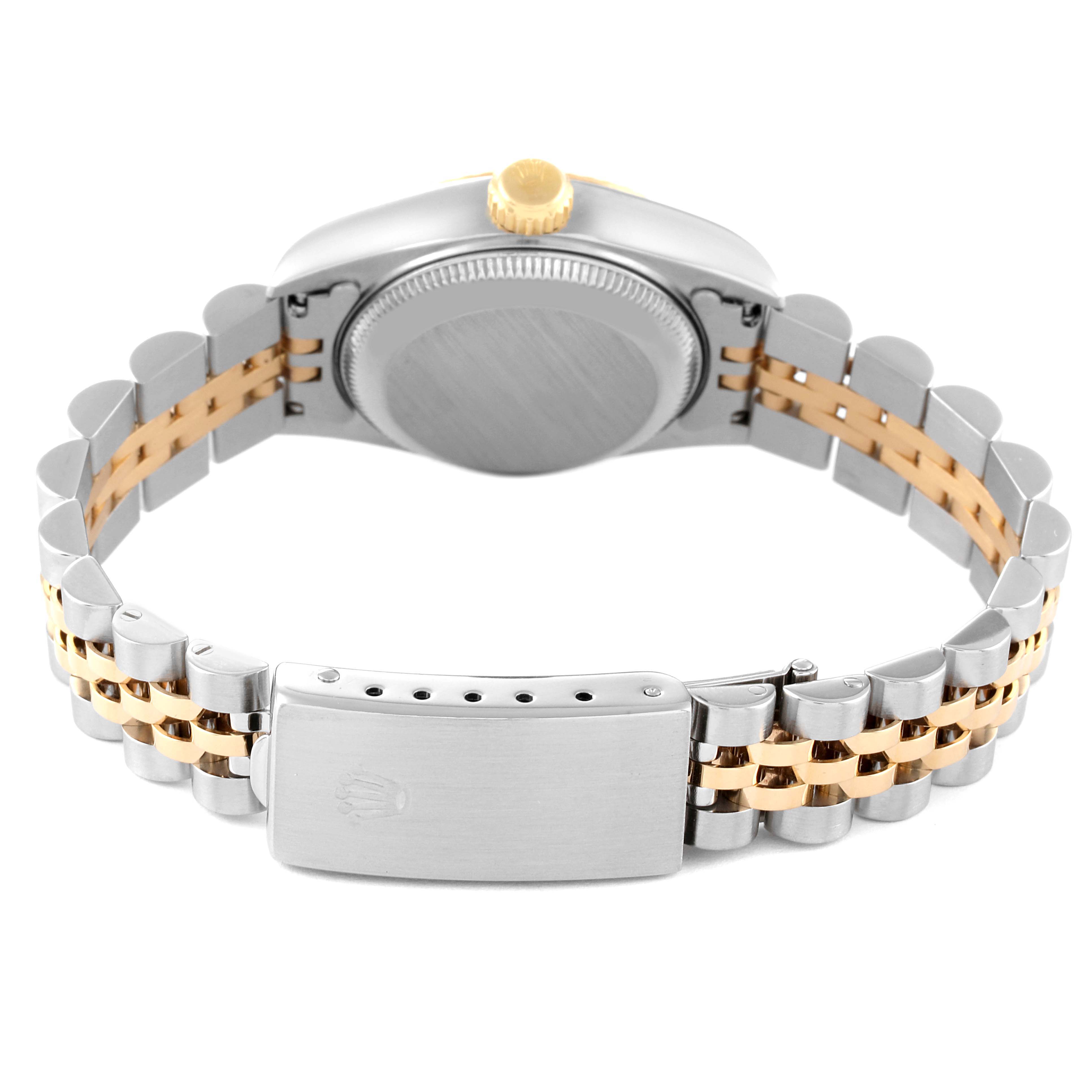 The image shows the back view of a Rolex Datejust 69173 Women's Steel and Gold (two tone) Champagne Dial 69173 Women's Steel and Gold (two tone) Champagne Dial watch with its two-tone link bracelet and clasp.