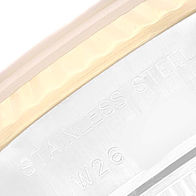 This image shows a close-up view of the stainless steel case back and edge of the bezel on a Rolex Datejust 69173 Women's Steel and Gold (two tone) Beige Dial 69173 Women's Steel and Gold (two tone) Beige Dial watch.