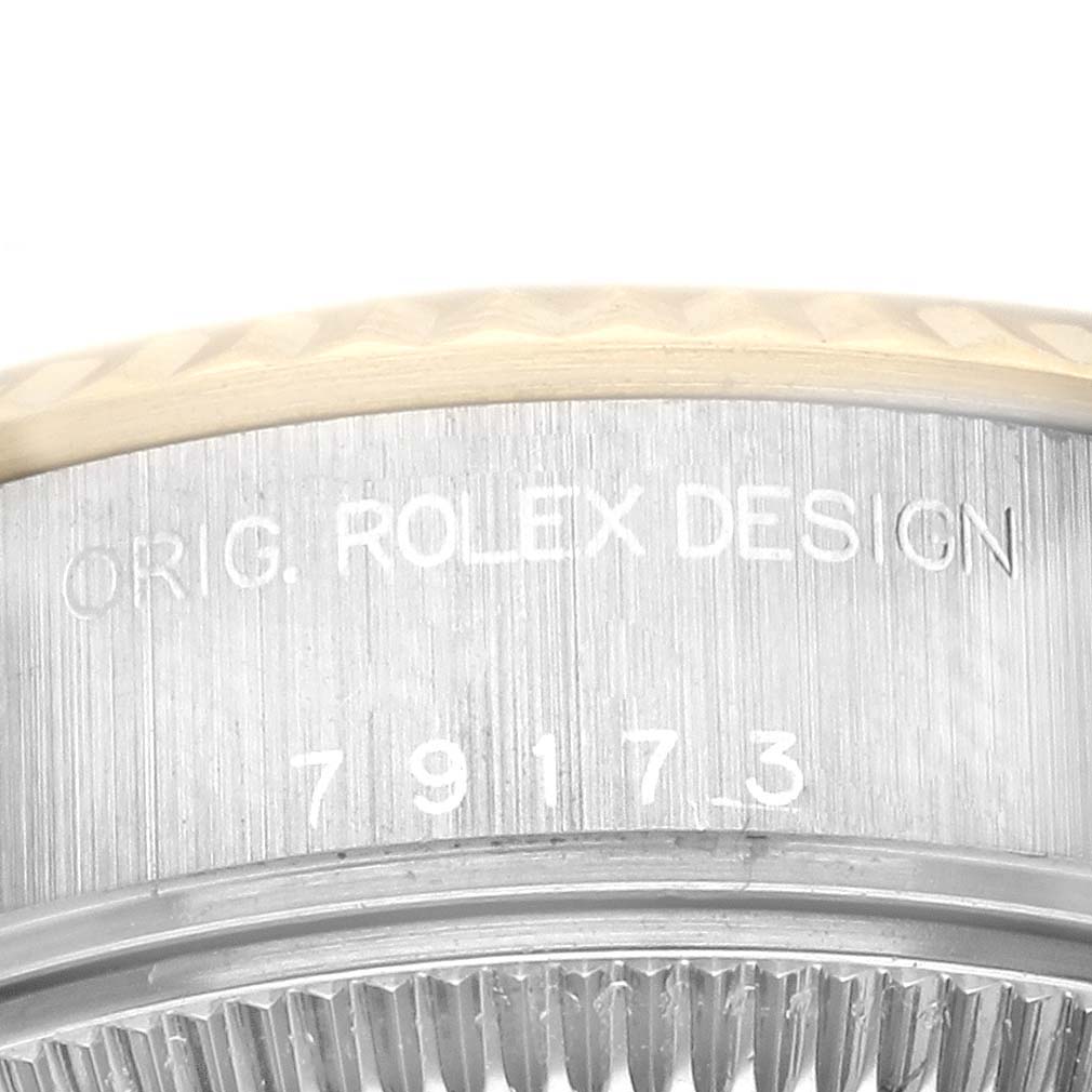 The image shows an engraved side view of the Rolex Datejust 79173 Women's Steel and Gold (two tone) Grey Dial 79173 Women's Steel and Gold (two tone) Grey Dial case, detailing the model number.