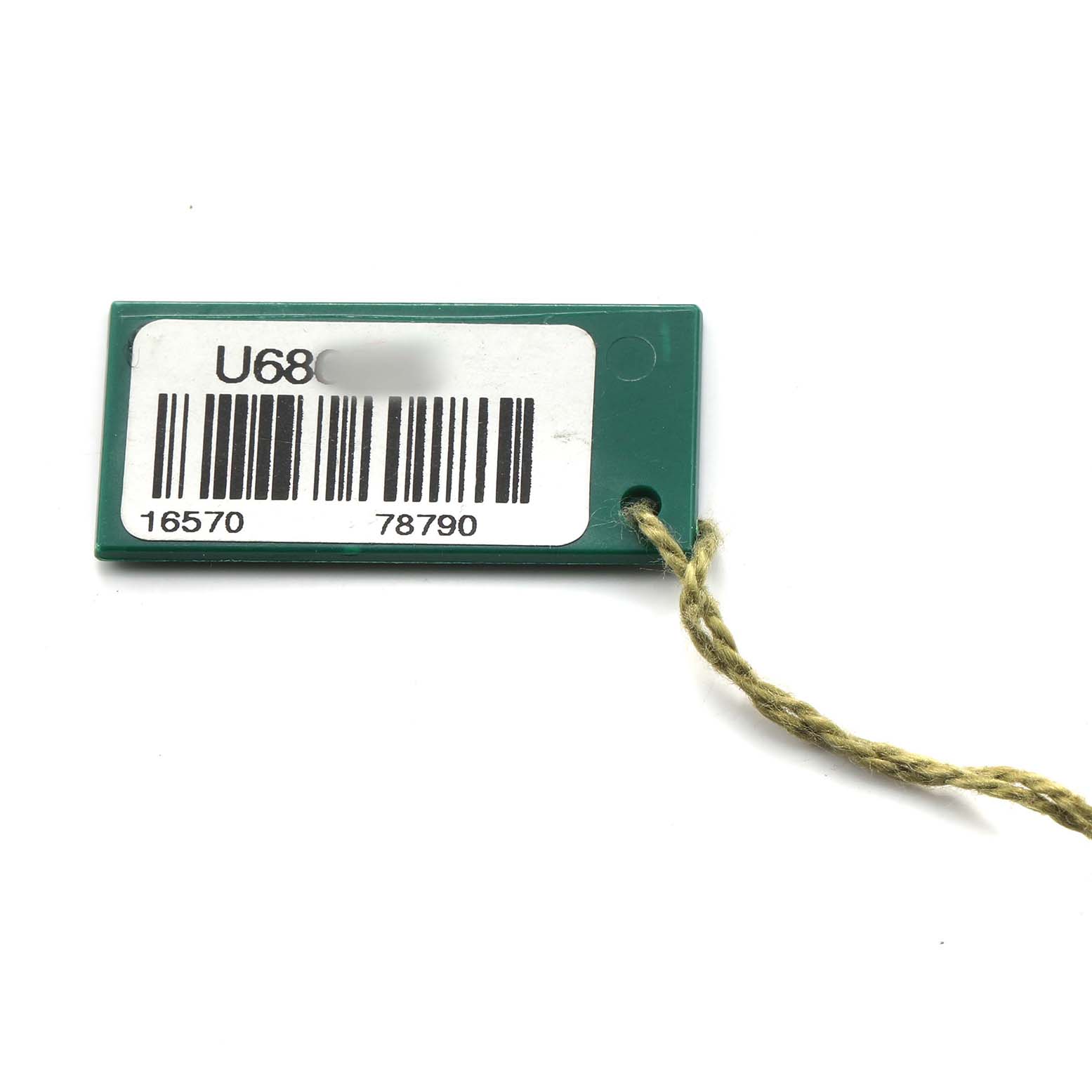 The image shows a green tag with a barcode related to a Rolex Explorer 16570 Men's Stainless Steel White Dial model.