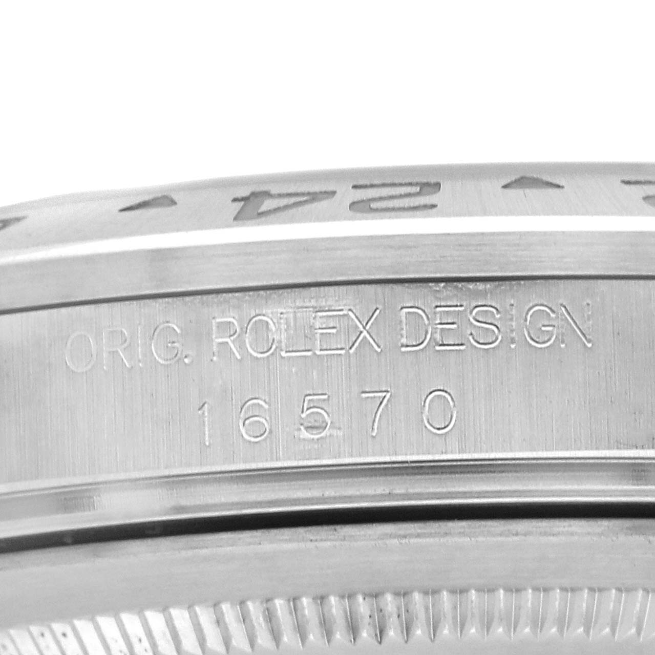The image shows a side view of the Rolex Explorer 16570 Men's Stainless Steel White Dial's engraved case, displaying "ORIG. ROLEX DESIGN" and the model number 16570.