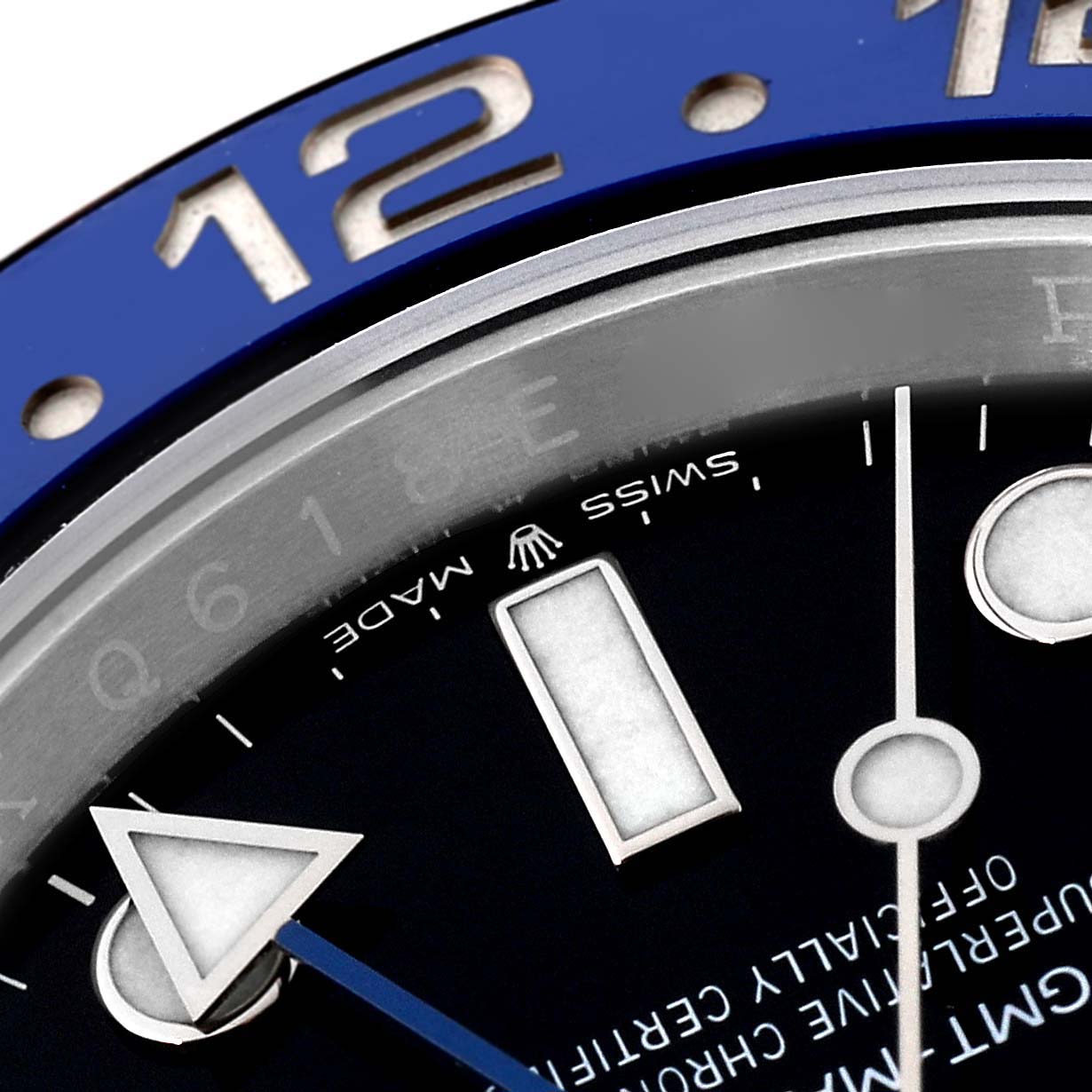 The image shows a close-up of the dial and bezel of the Rolex GMT-Master 126710 Men's Stainless Steel Black Dial 126710 Men's Stainless Steel Black Dial, highlighting the hour markers and part of the 12 o'clock area.