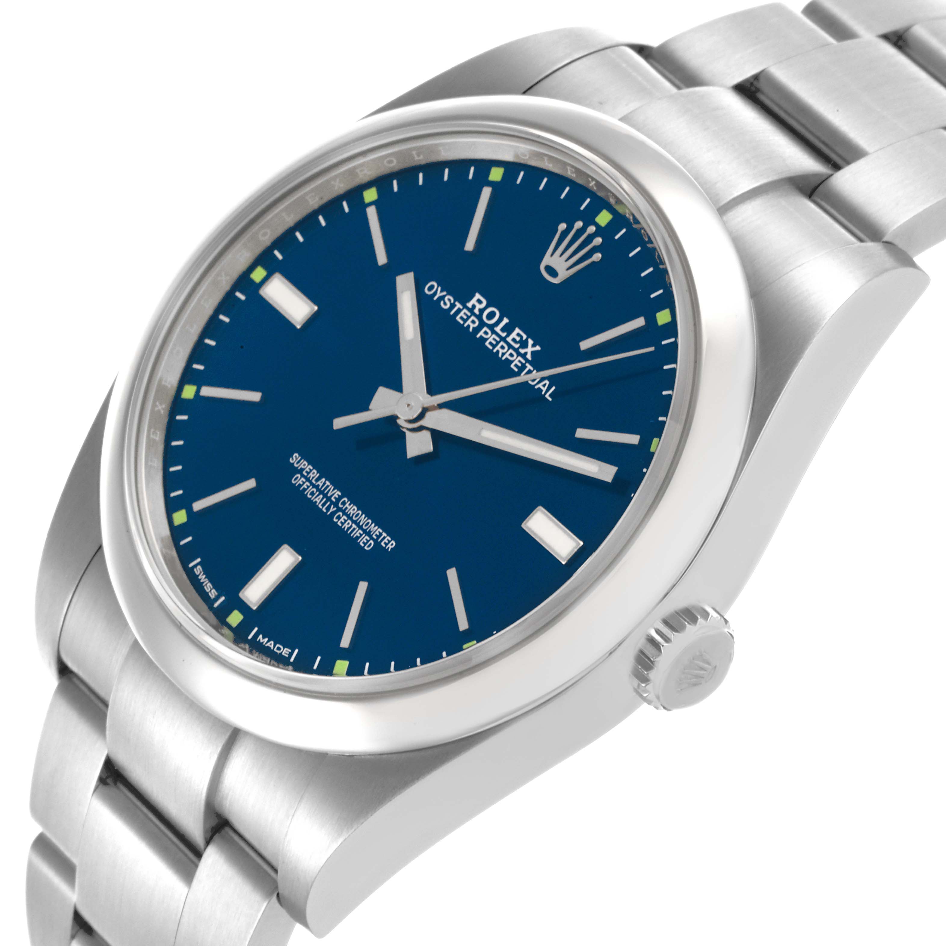 The image shows a Rolex Oyster Perpetual 114300 Men's Stainless Steel Blue Dial 114300 Men's Stainless Steel Blue Dial watch at a tilted angle, highlighting the blue dial, crown, and stainless steel bracelet.