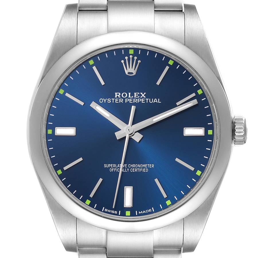 The image shows a front view of the Rolex Oyster Perpetual watch, displaying its blue dial and stainless steel bracelet.