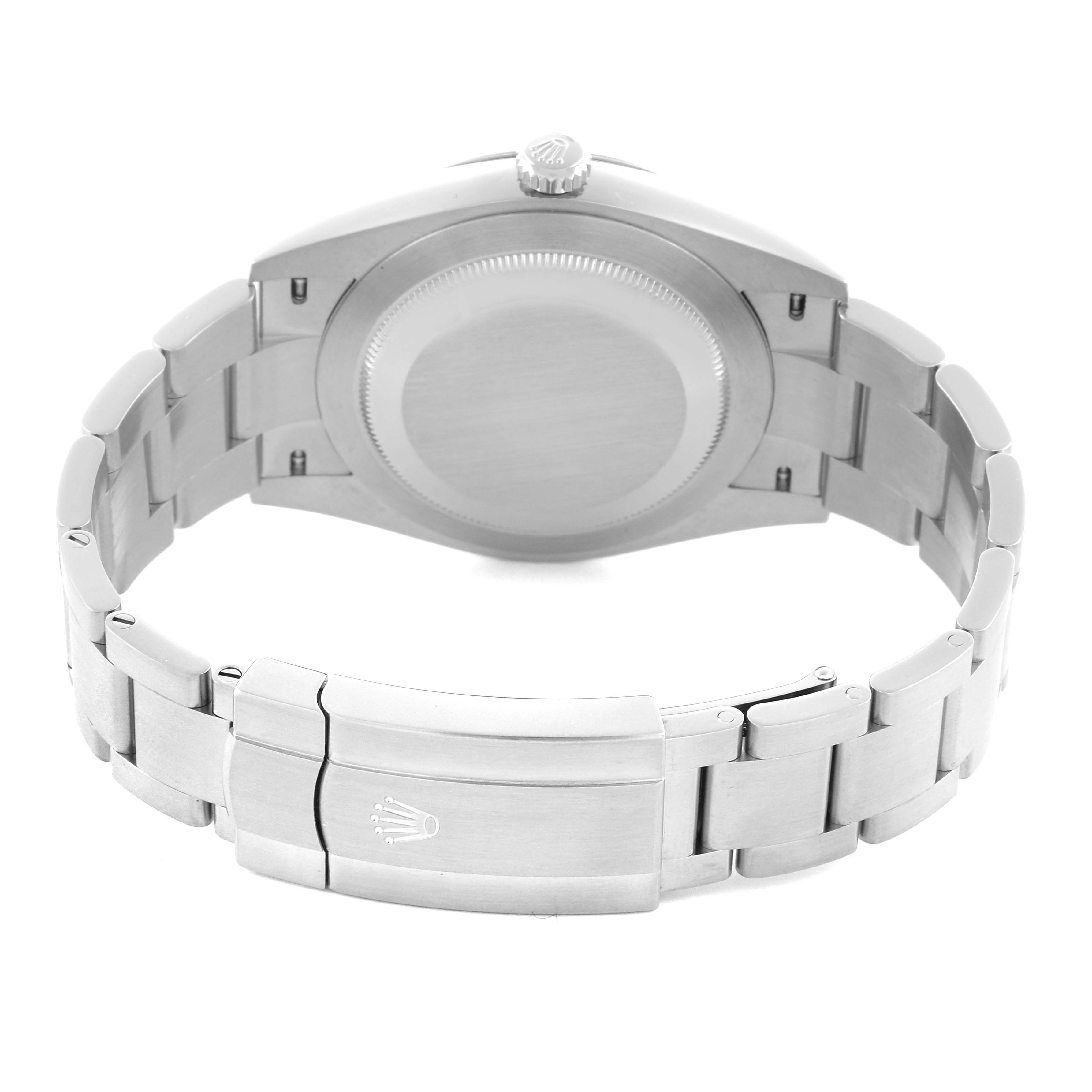 The image shows the back case and bracelet clasp of a Rolex Oyster Perpetual 124300 Men
s Stainless Steel Black Dial 124300 Men
s Stainless Steel Black Dial watch from a rear angle.