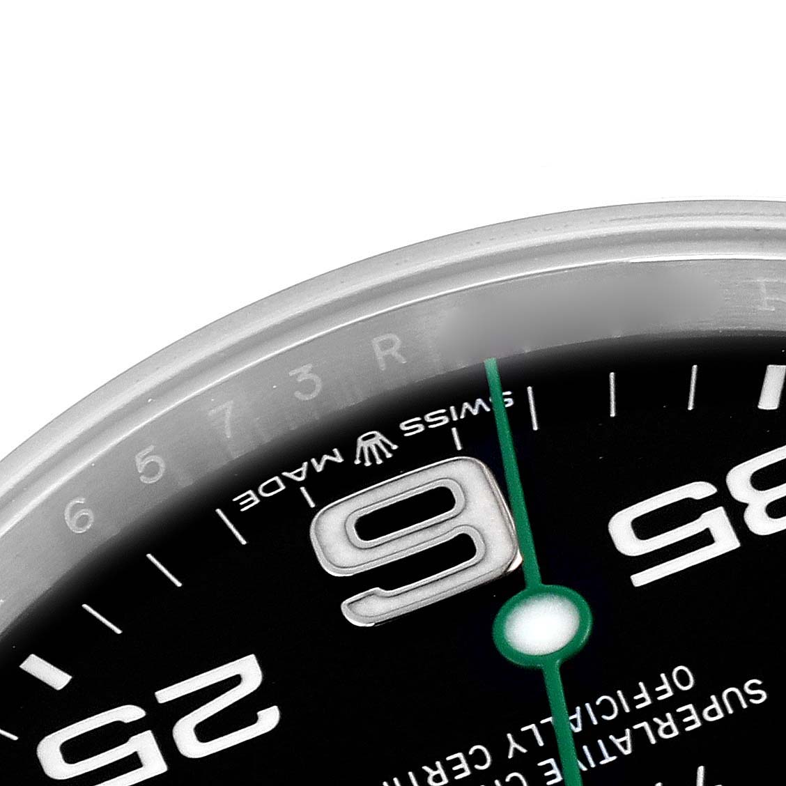 The image shows a close-up of the Rolex Air-King 126900 Men's Stainless Steel Black Dial 126900 Men's Stainless Steel Black Dial watch face, featuring the '6' numeral, indices, and part of the bezel.