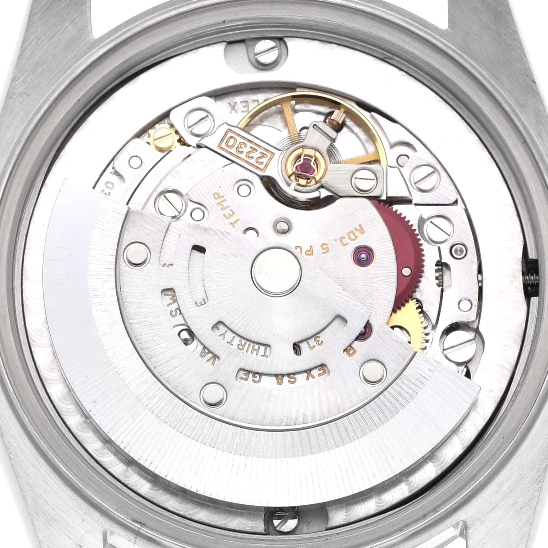This image shows a close-up of the movement of a Rolex Mid-Size 77080 Women's Stainless Steel Pink Dial 77080 Women's Stainless Steel Pink Dial watch from the back.