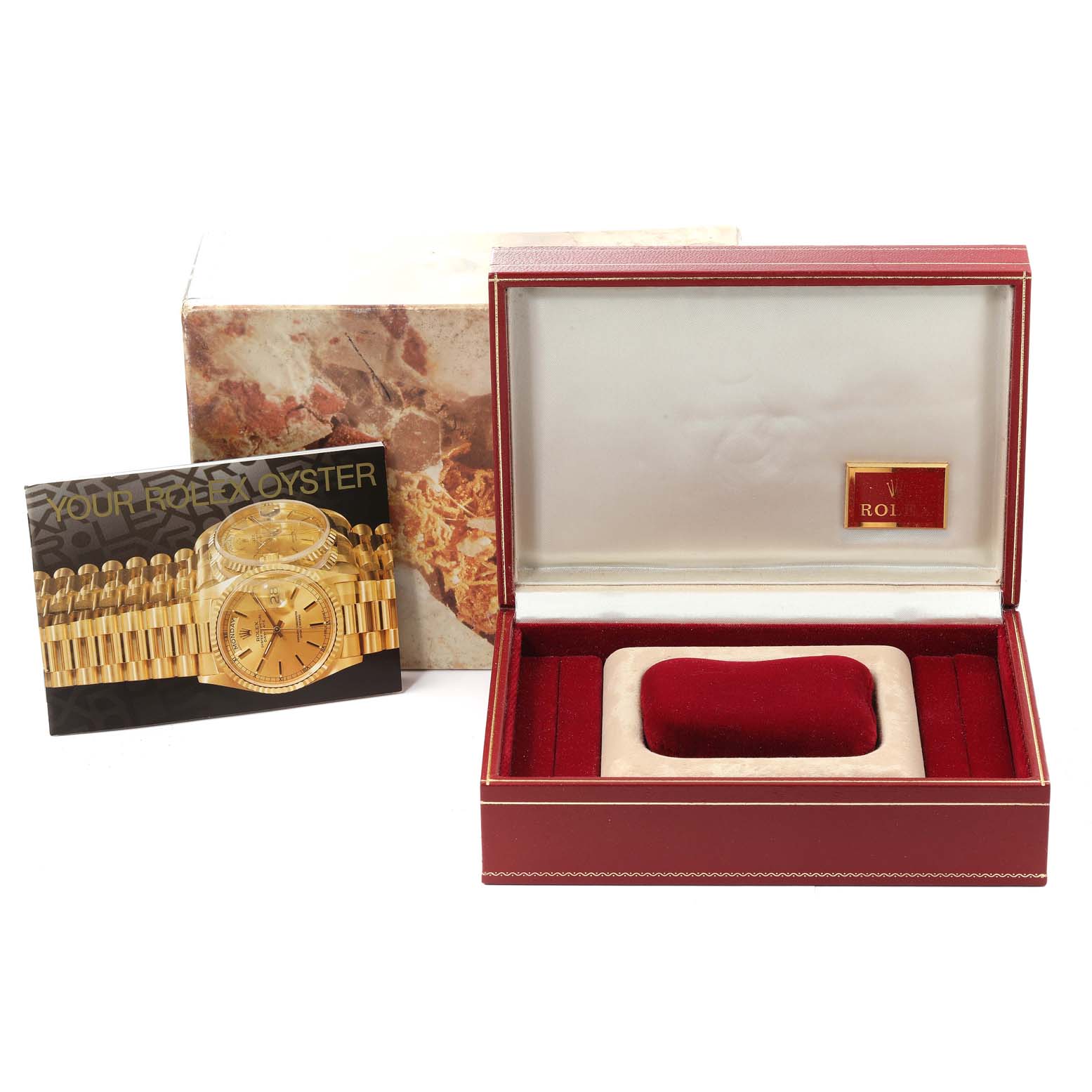 The image shows an empty Rolex President 68278 Women
s Yellow Gold White Dial 68278 Women
s Yellow Gold White Dial watch box with a brochure of the watch model placed beside it.