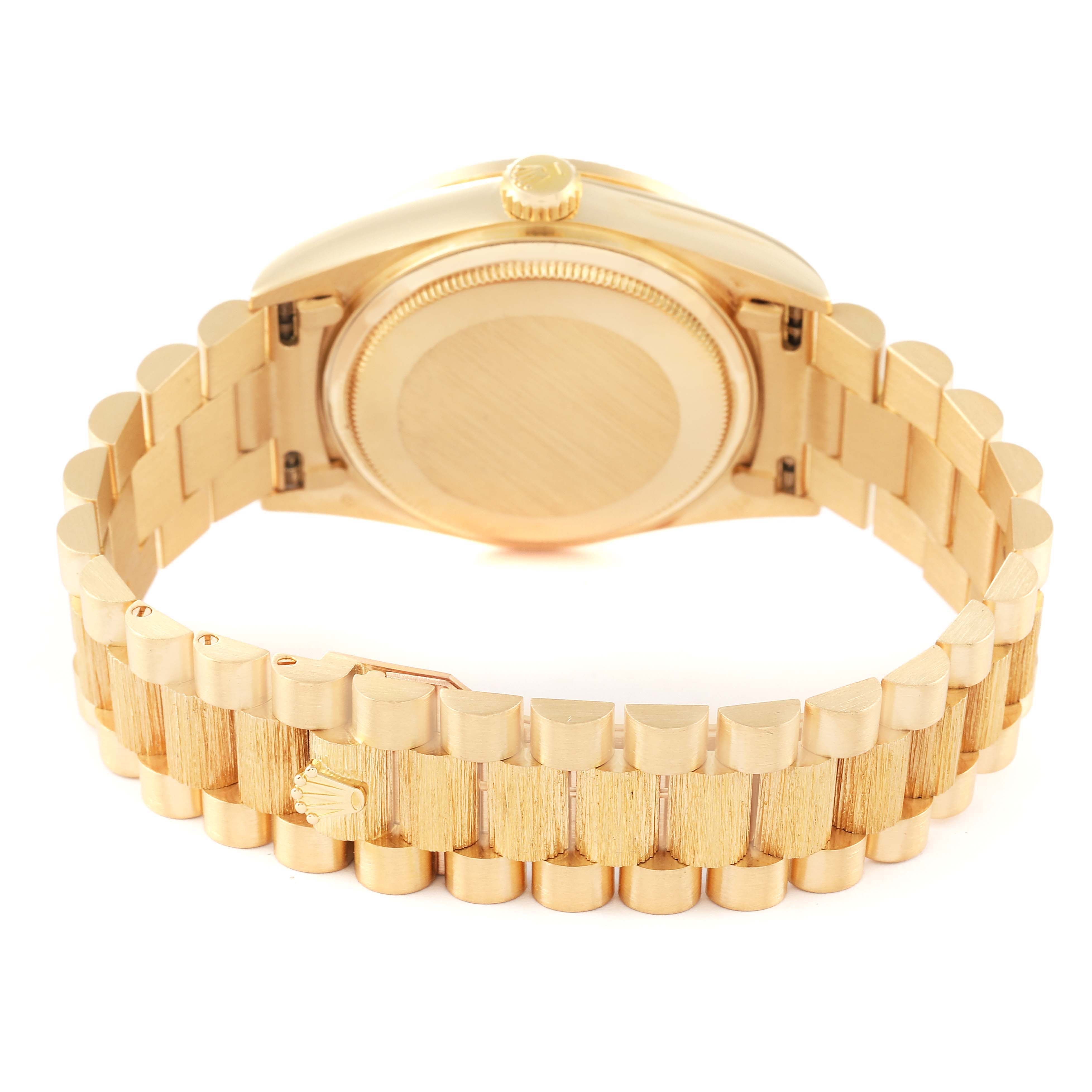 The image shows the backside and bracelet of a Rolex President 18108 Men
s Yellow Gold Champagne Dial 18108 Men
s Yellow Gold Champagne Dial model watch, emphasizing the gold case and band.