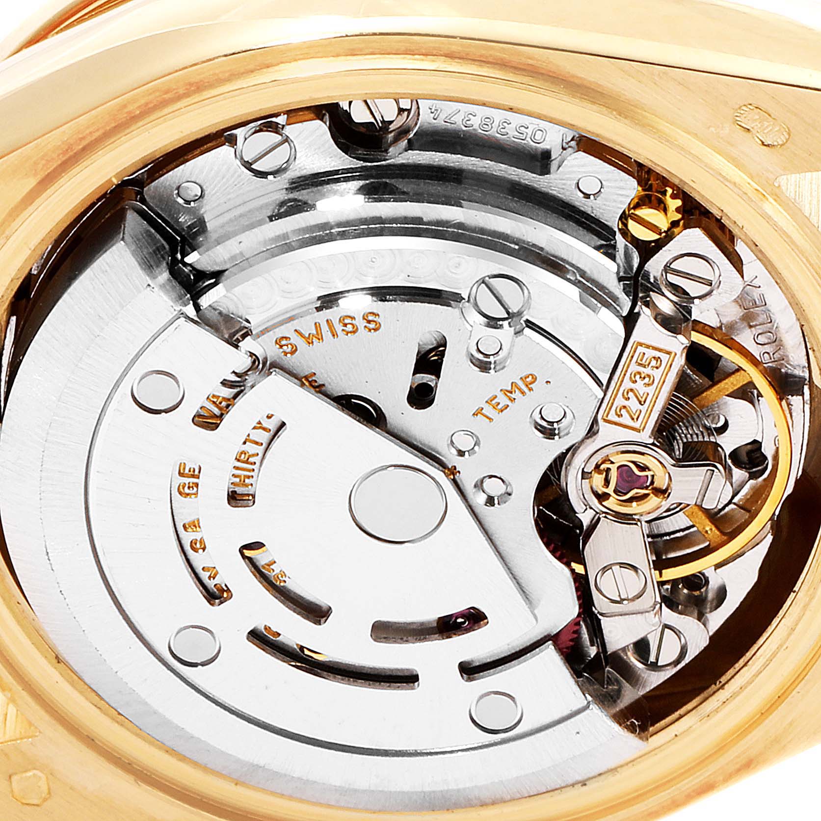 This image shows an up-close view of the movement mechanism inside a Rolex President 79138 Women
s Yellow Gold Mother of Pearl Dial 79138 Women
s Yellow Gold Mother of Pearl Dial model watch.