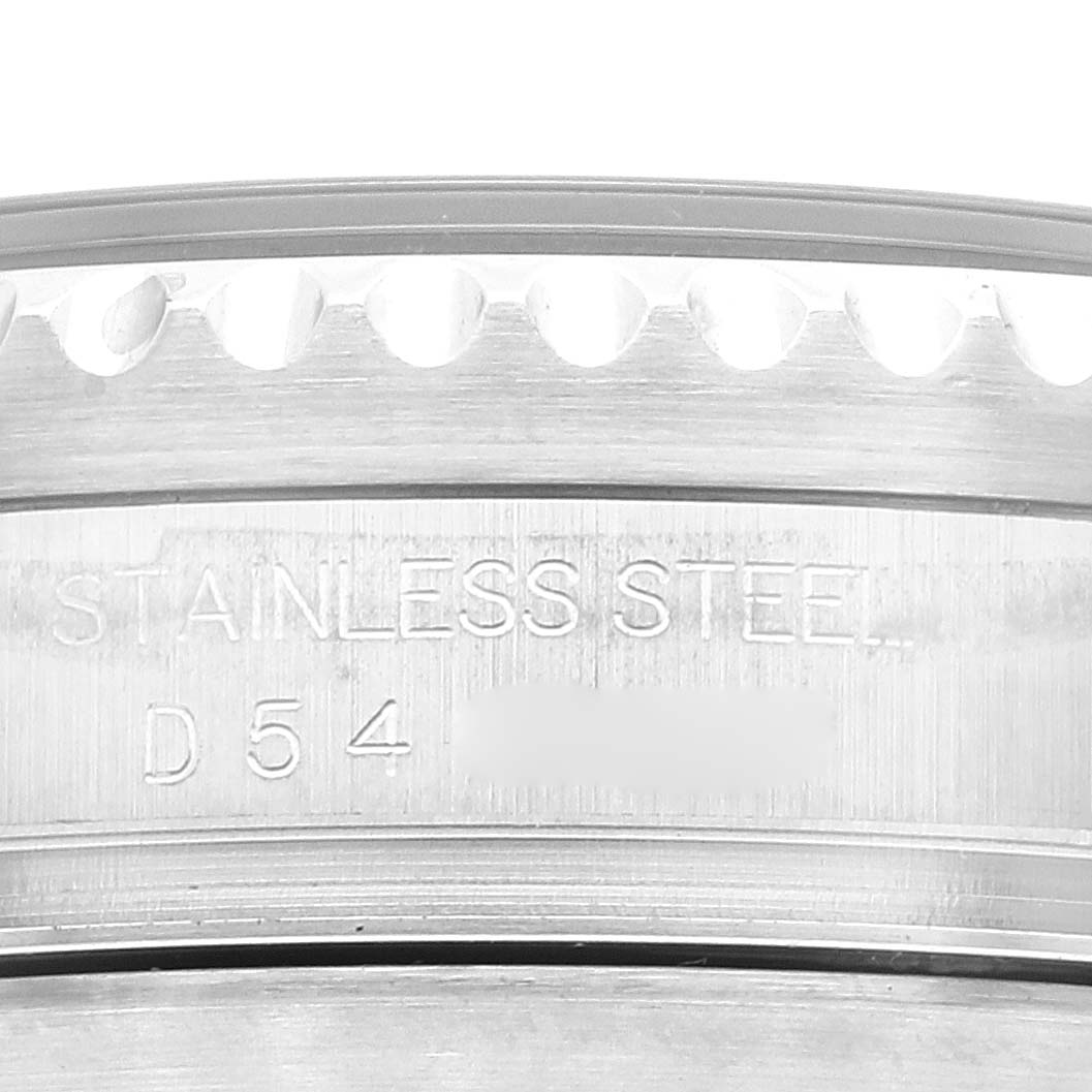 This close-up image shows the stainless steel bezel and part of the case of a Rolex Sea-Dweller 16600T Men's Stainless Steel Black Dial 16600T Men's Stainless Steel Black Dial watch.