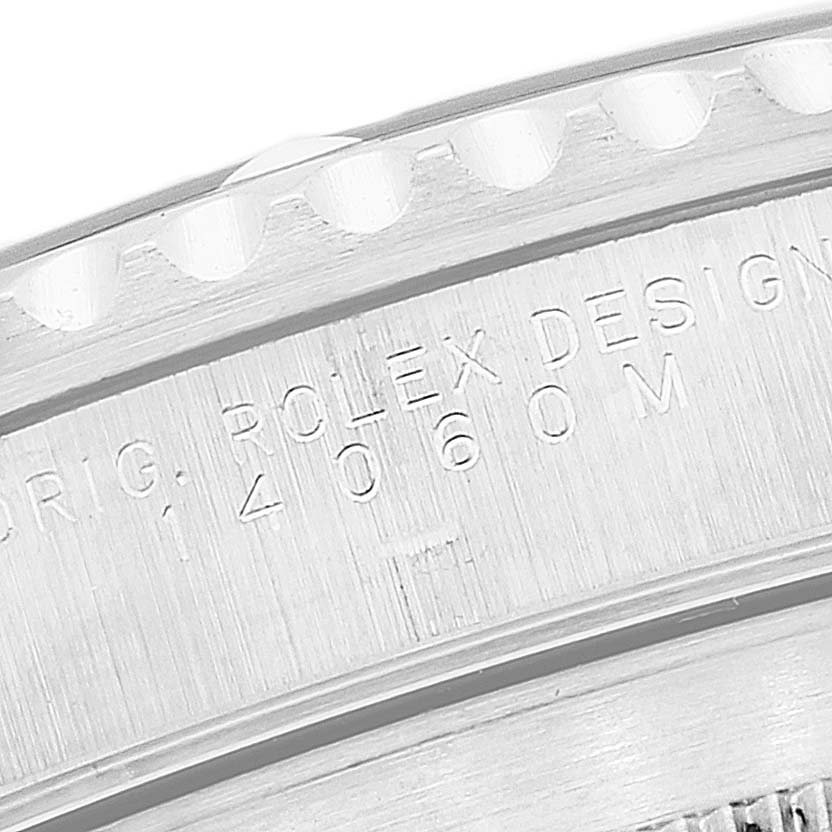 This is a close-up angle of the engravings on the bezel of a Rolex Submariner 14060 Men
s Stainless Steel Black Dial 14060 Men
s Stainless Steel Black Dial watch.