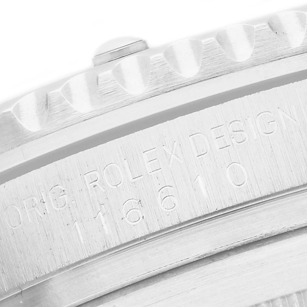 The image shows the side of the bezel and case with engraved details of a Rolex Submariner 116610 Men's Stainless Steel Black Dial watch.