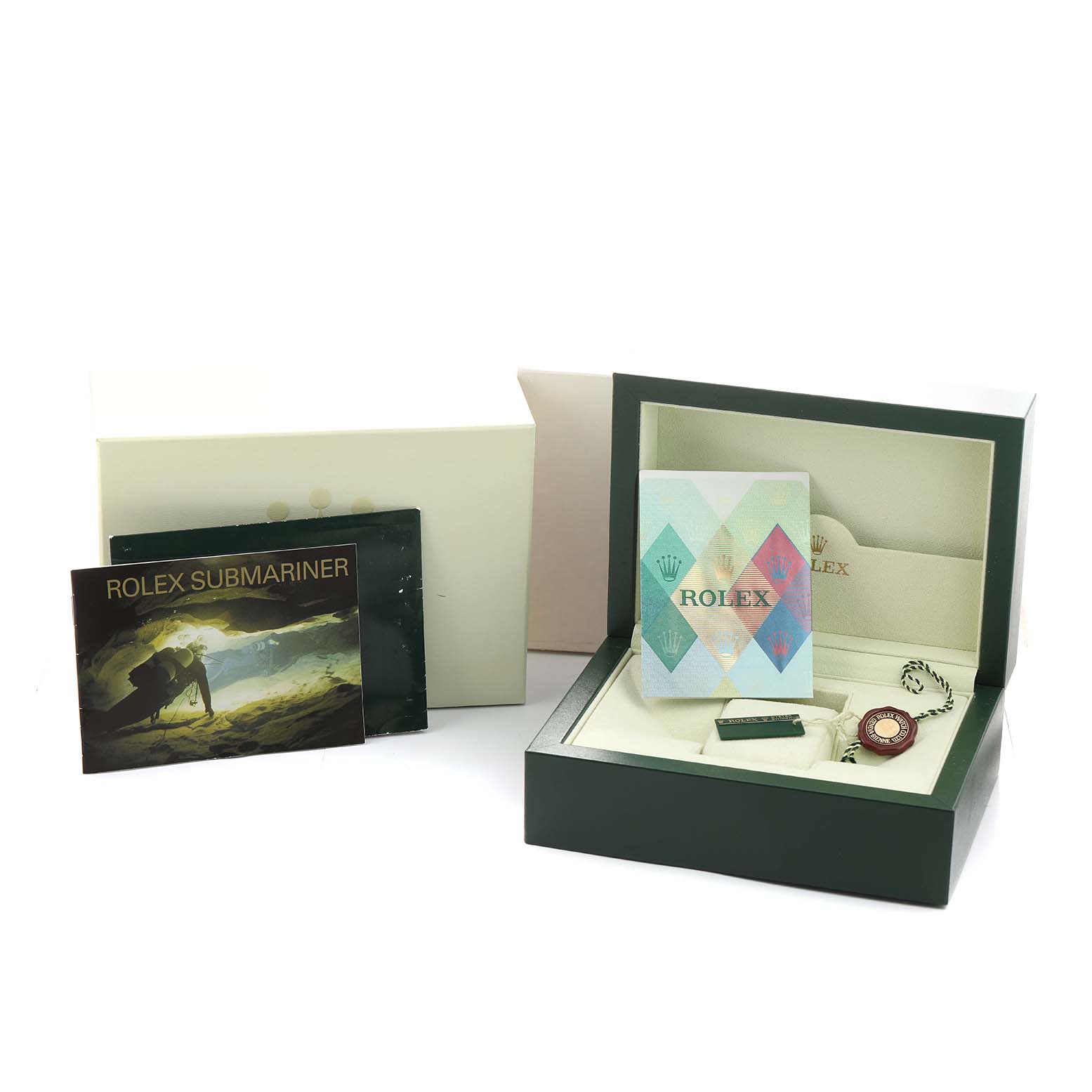 The image shows a Rolex Submariner 16613 Men's Steel and Gold (two tone) Black Dial watch box, its open cover revealing booklets and accessories like a tag and authenticity card.