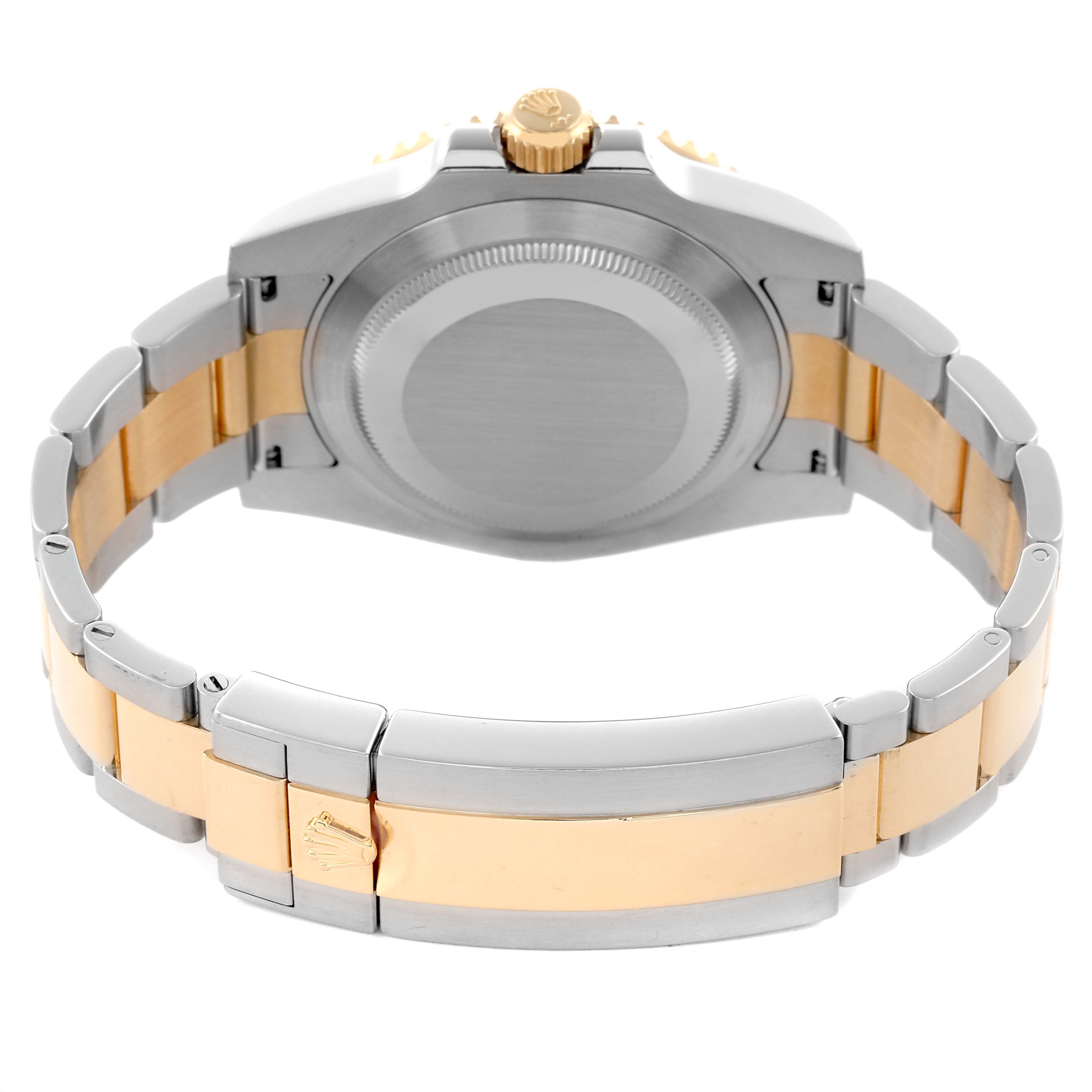 The image shows the back of the Rolex Submariner 116613LB Men's Steel and Gold (two tone) Blue Dial 116613LB Men's Steel and Gold (two tone) Blue Dial, highlighting the case back, crown, and two-tone bracelet.