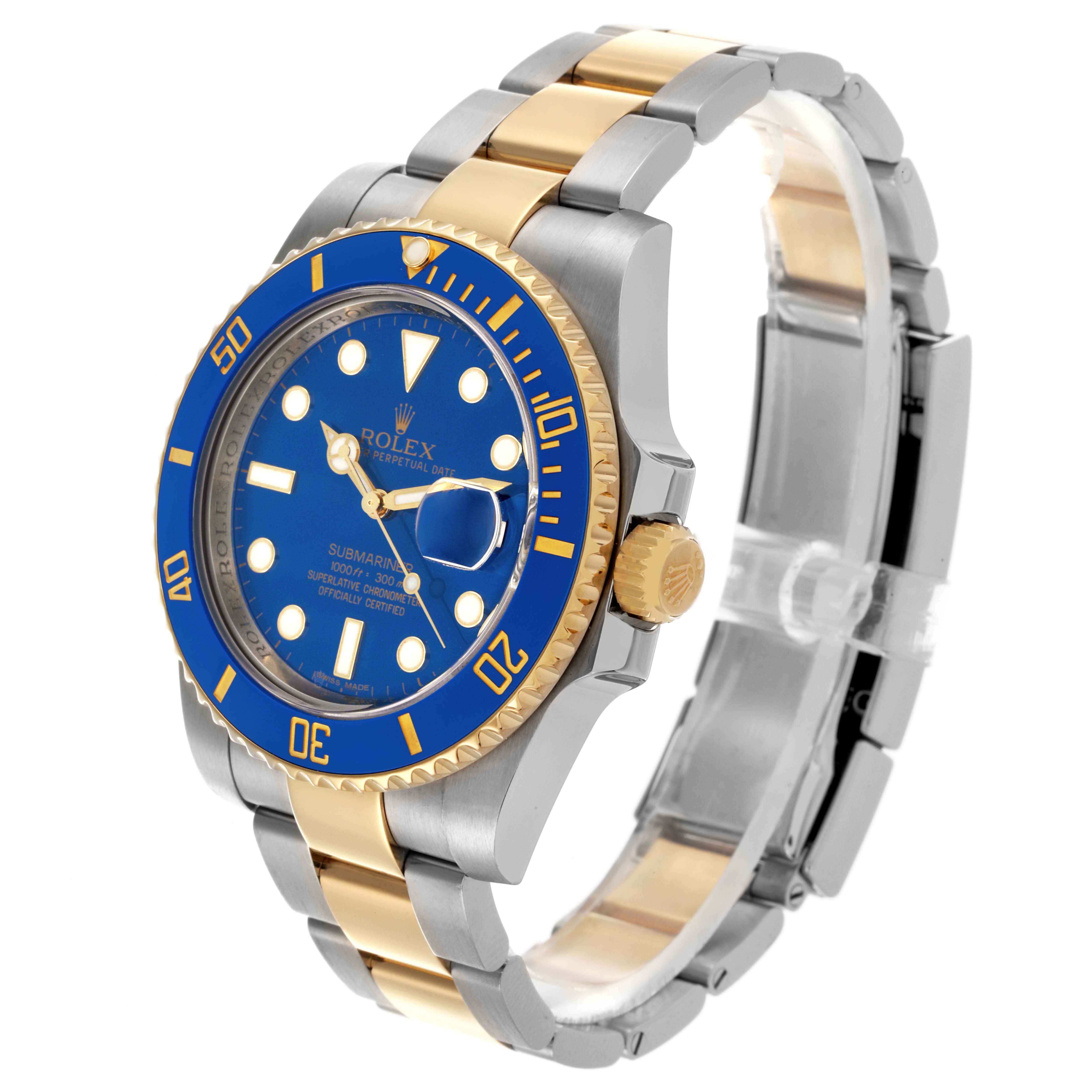 The Rolex Submariner 116613LB Men's Steel and Gold (two tone) Blue Dial 116613LB Men's Steel and Gold (two tone) Blue Dial is shown at a three-quarter angle, highlighting the blue dial, bezel, gold crown, and two-tone bracelet.