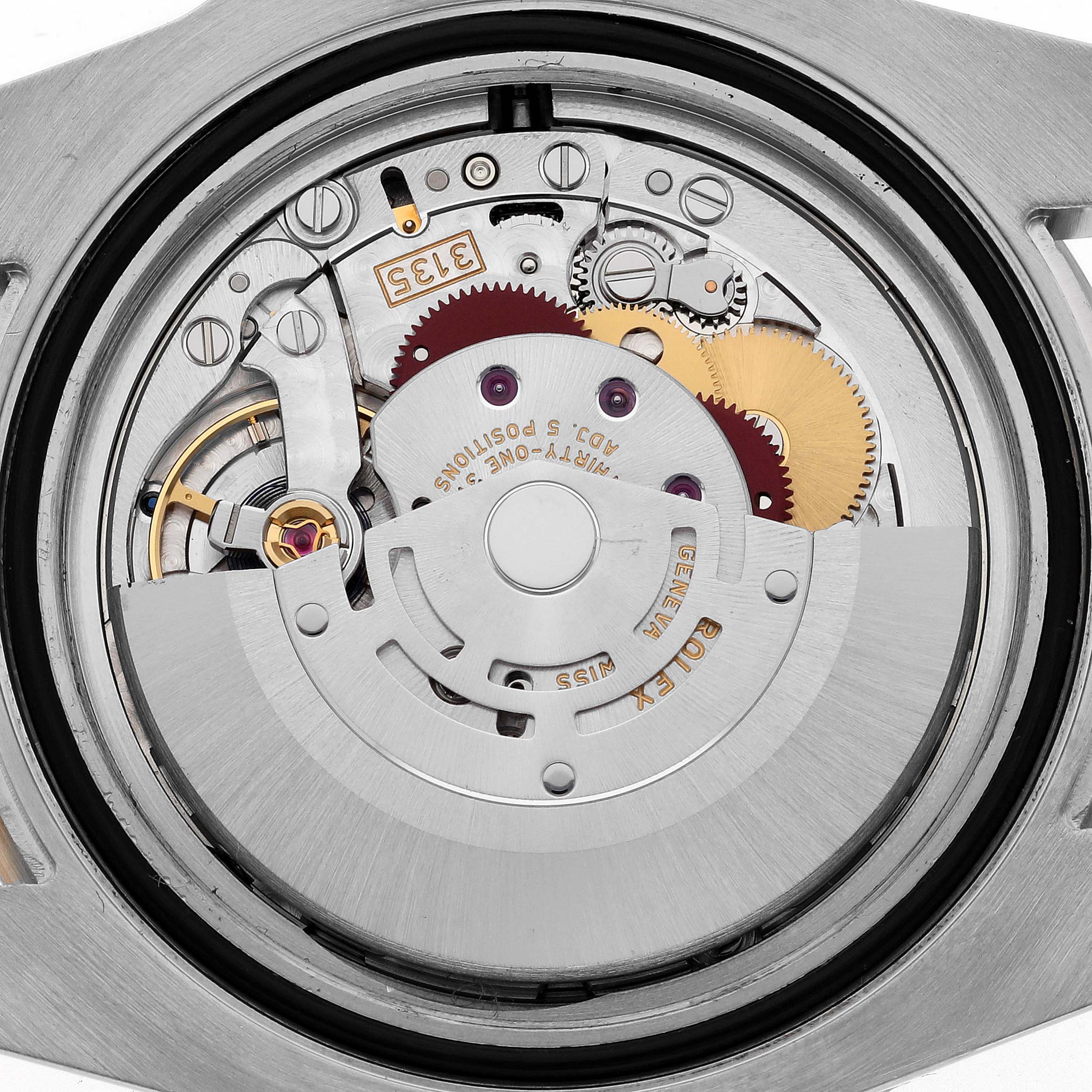 The image shows the internal mechanical movement parts of a Rolex Submariner 116613LB Men's Steel and Gold (two tone) Blue Dial 116613LB Men's Steel and Gold (two tone) Blue Dial watch from a back angle.