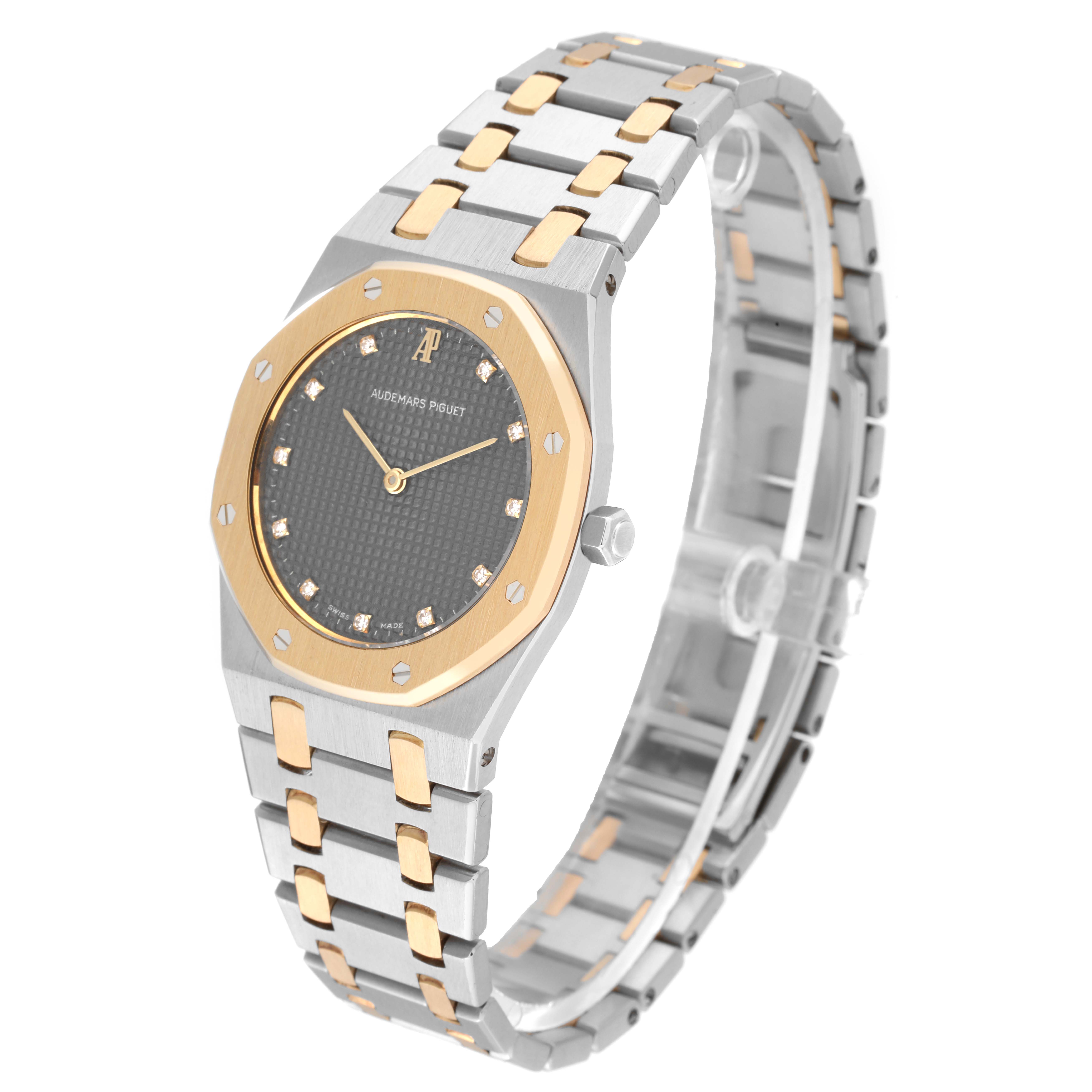 The image shows an angled view of the Audemars Piguet Royal Oak 56303SA Men's Steel and Gold (two tone) Grey Dial 56303SA Men's Steel and Gold (two tone) Grey Dial watch displaying the face, bezel, crown, and bracelet.