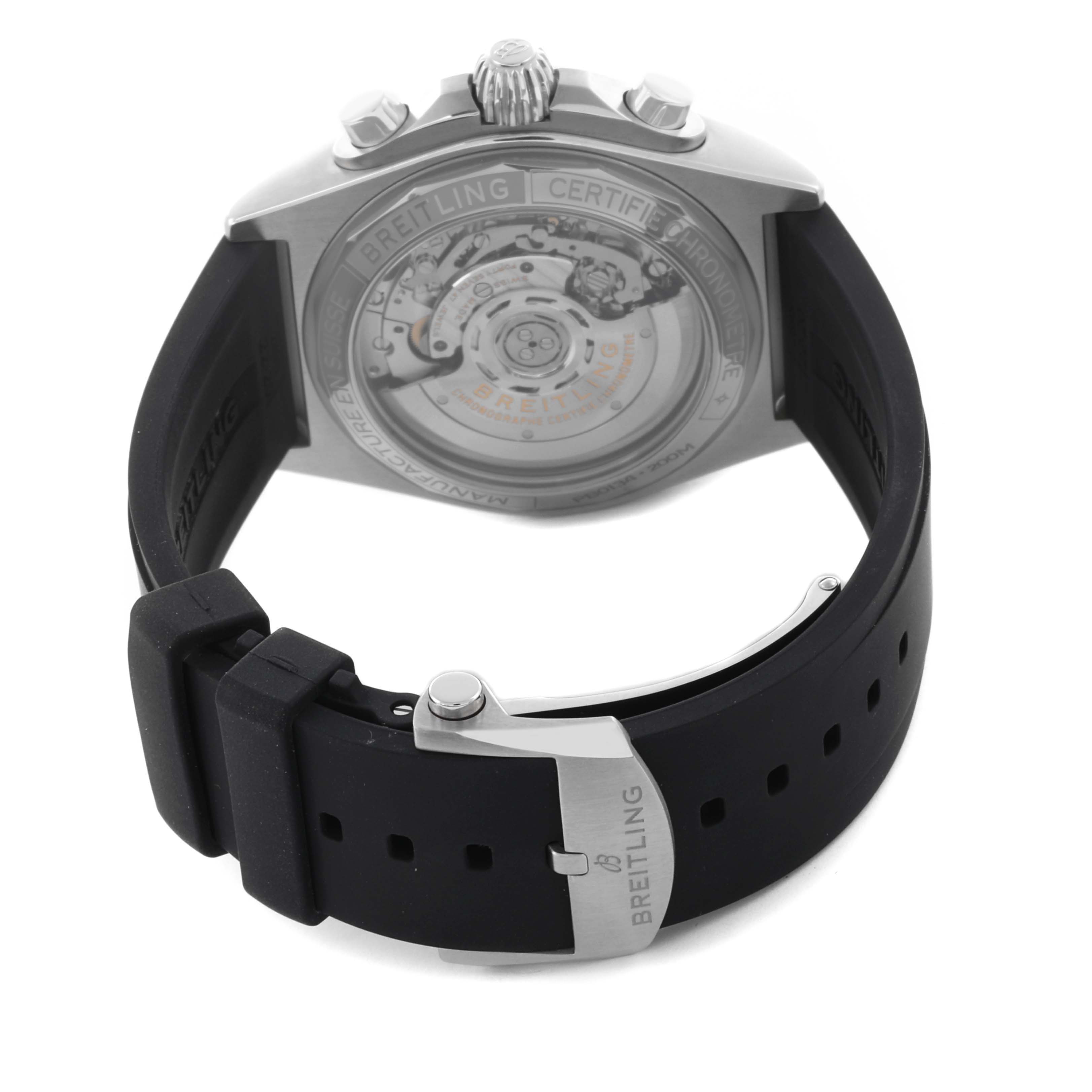 The Breitling Chronomat PB0134 Men's Stainless Steel Blue Dial PB0134 Men's Stainless Steel Blue Dial watch is shown from the back, highlighting the movement and rubber strap with buckle.