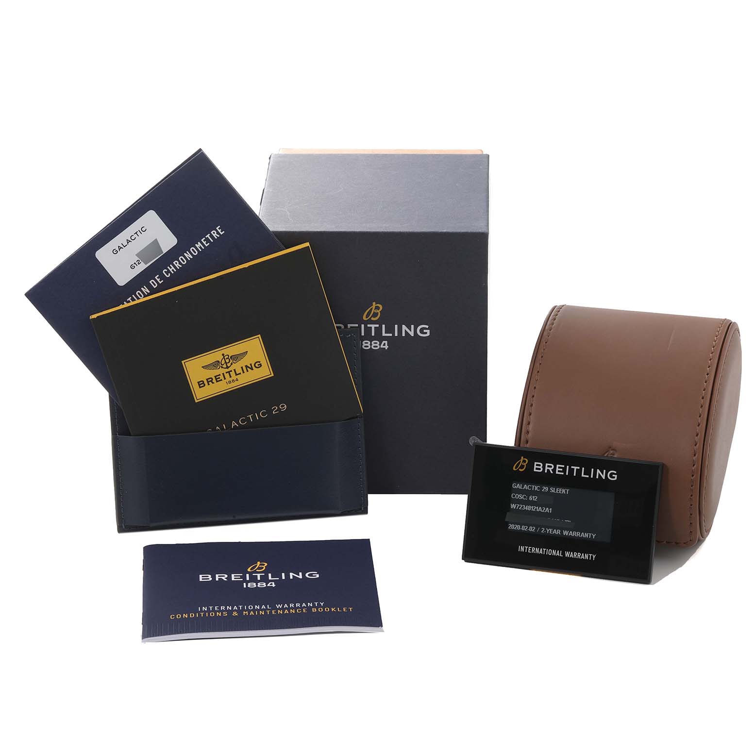 The image shows the packaging, booklets, case, and warranty card for the Breitling W72348 Women's Stainless Steel Mother of Pearl Dial W72348 Women's Stainless Steel Mother of Pearl Dial Galactic 29mm Mother Of Pearl Diamond Dial Steel Ladies Watch W72348 Unworn model.