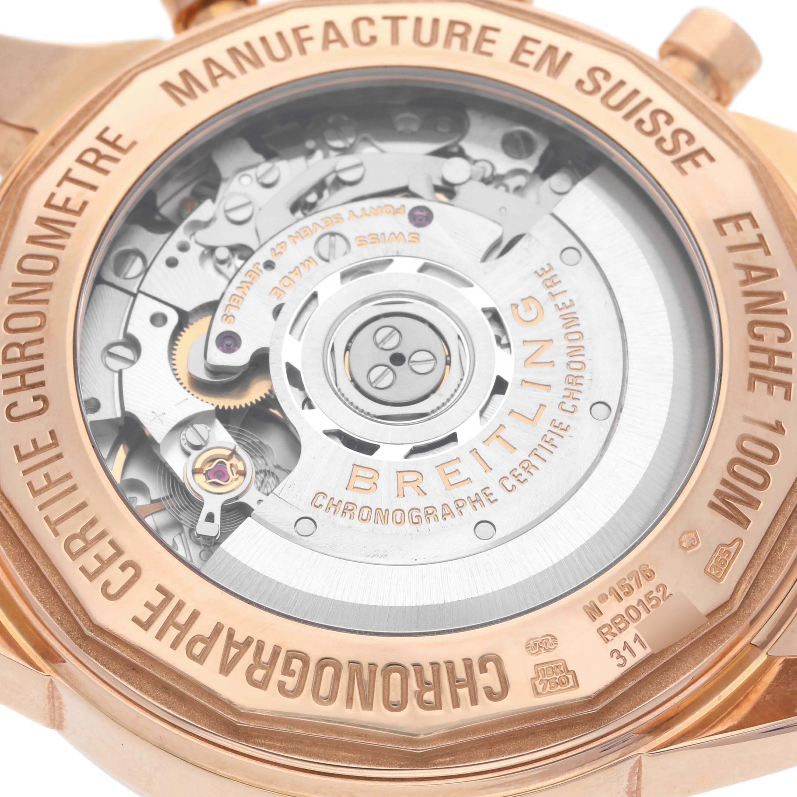 This image shows the back of the Breitling Transocean RB0152 Men's Rose Gold Silver Dial RB0152 Men's Rose Gold Silver Dial watch, featuring its visible movement and engraved details.