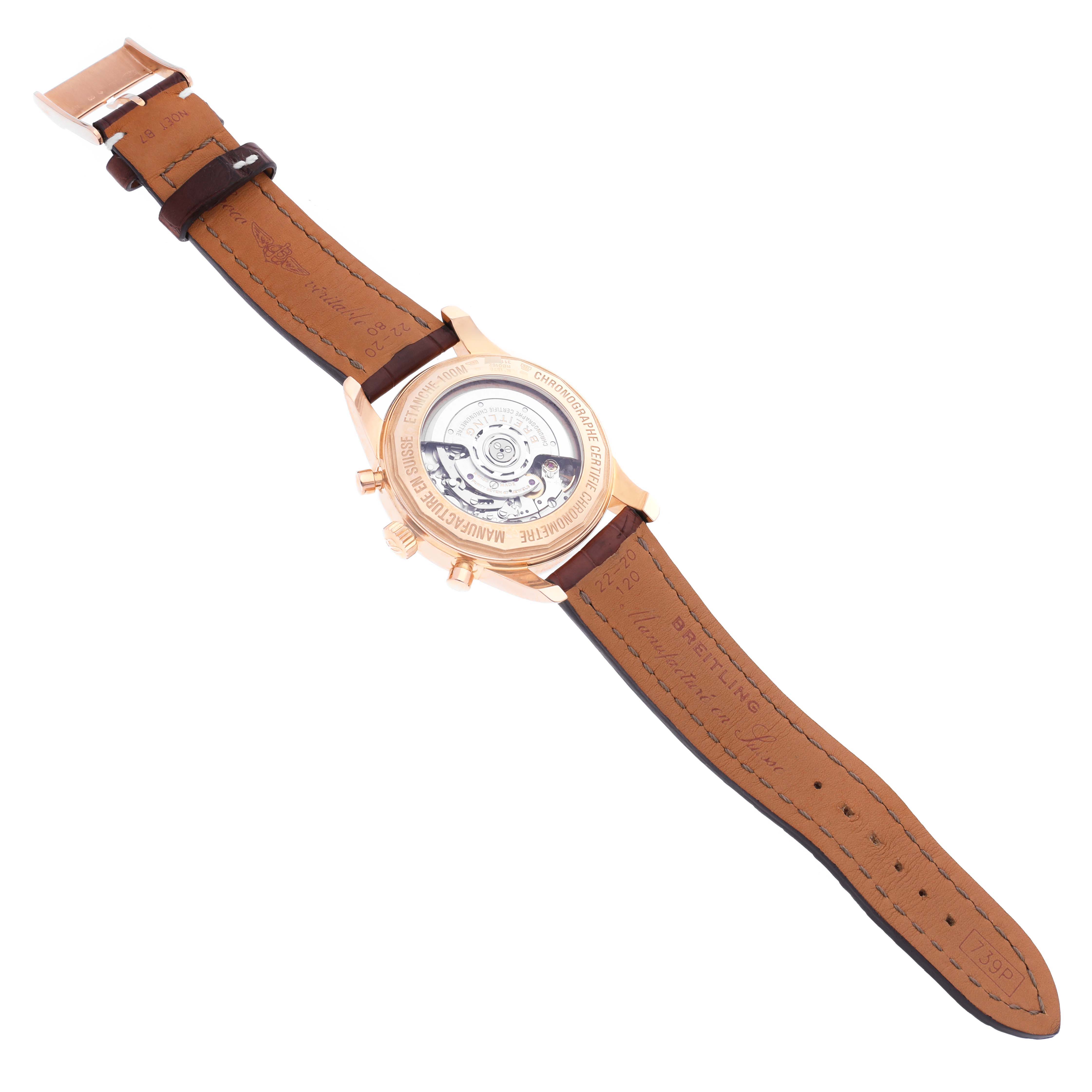 The Breitling Transocean RB0152 Men's Rose Gold Silver Dial RB0152 Men's Rose Gold Silver Dial watch is shown from the back, highlighting the movement and leather strap.