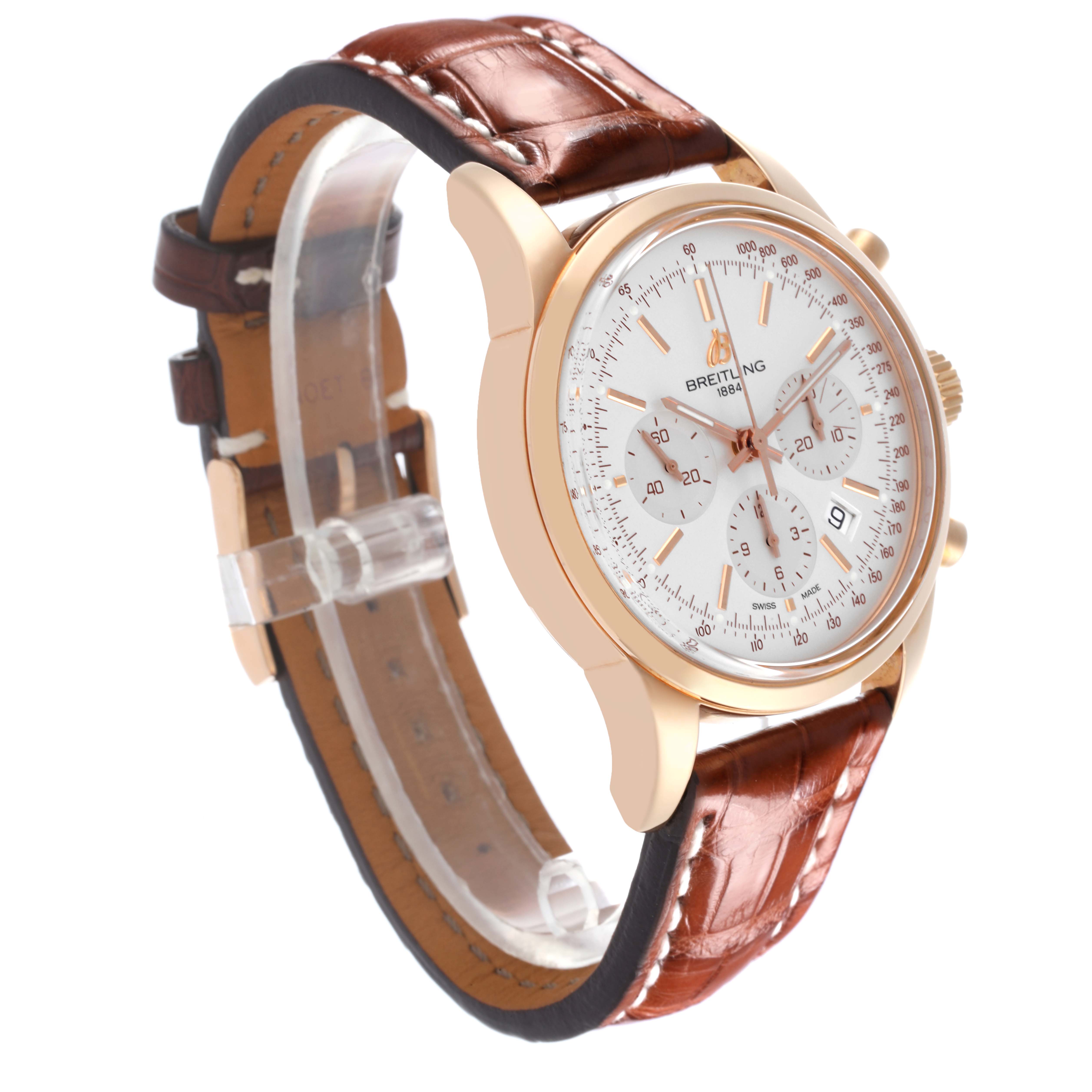 The Breitling Transocean RB0152 Men's Rose Gold Silver Dial RB0152 Men's Rose Gold Silver Dial watch is shown at a three-quarter angle, displaying the face, bezel, pushers, crown, and strap.