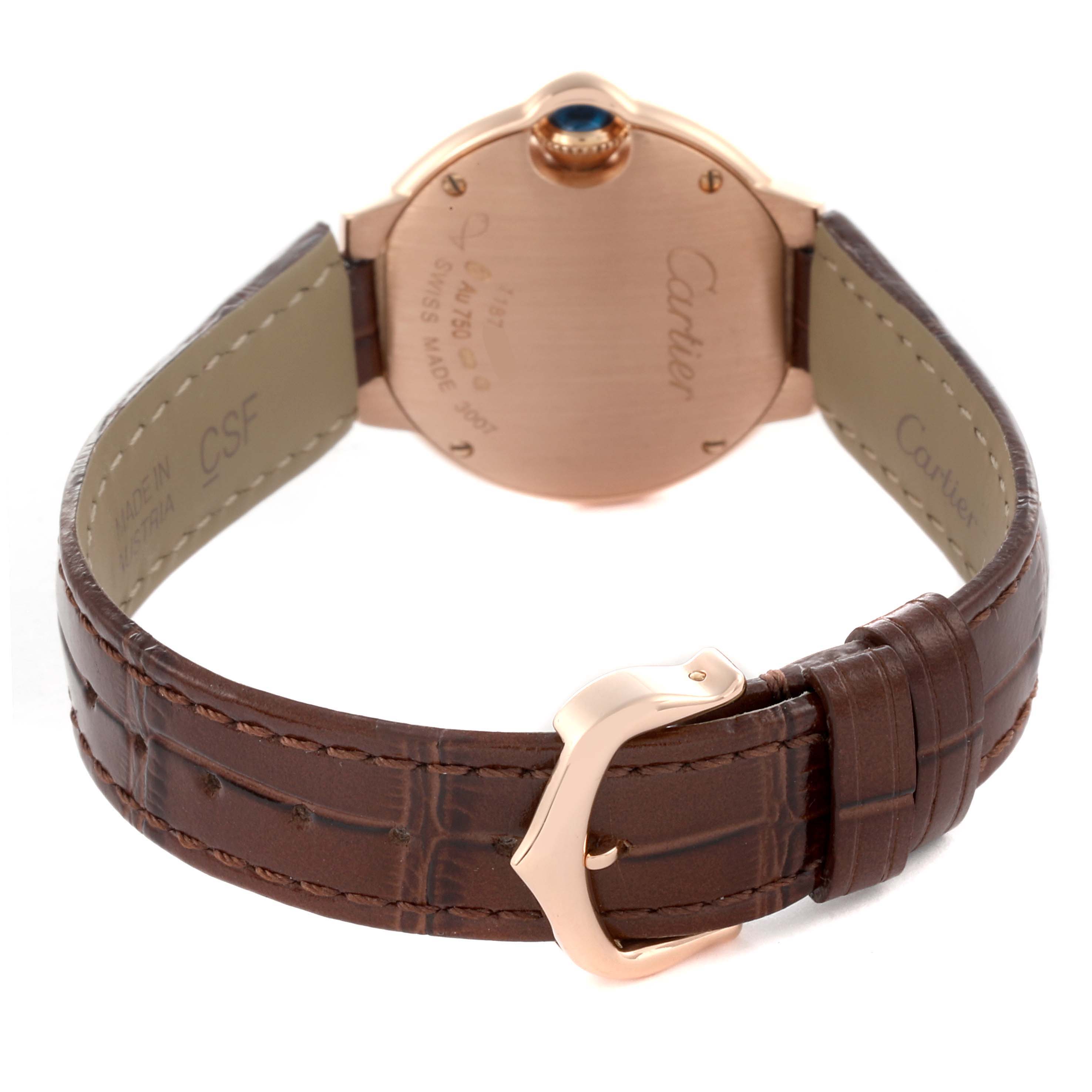 The image shows the back view of the Cartier Ballon Bleu W6900256 Women
s Rose Gold Silver Dial W6900256 Women
s Rose Gold Silver Dial watch, highlighting the case back, crown, and leather strap.