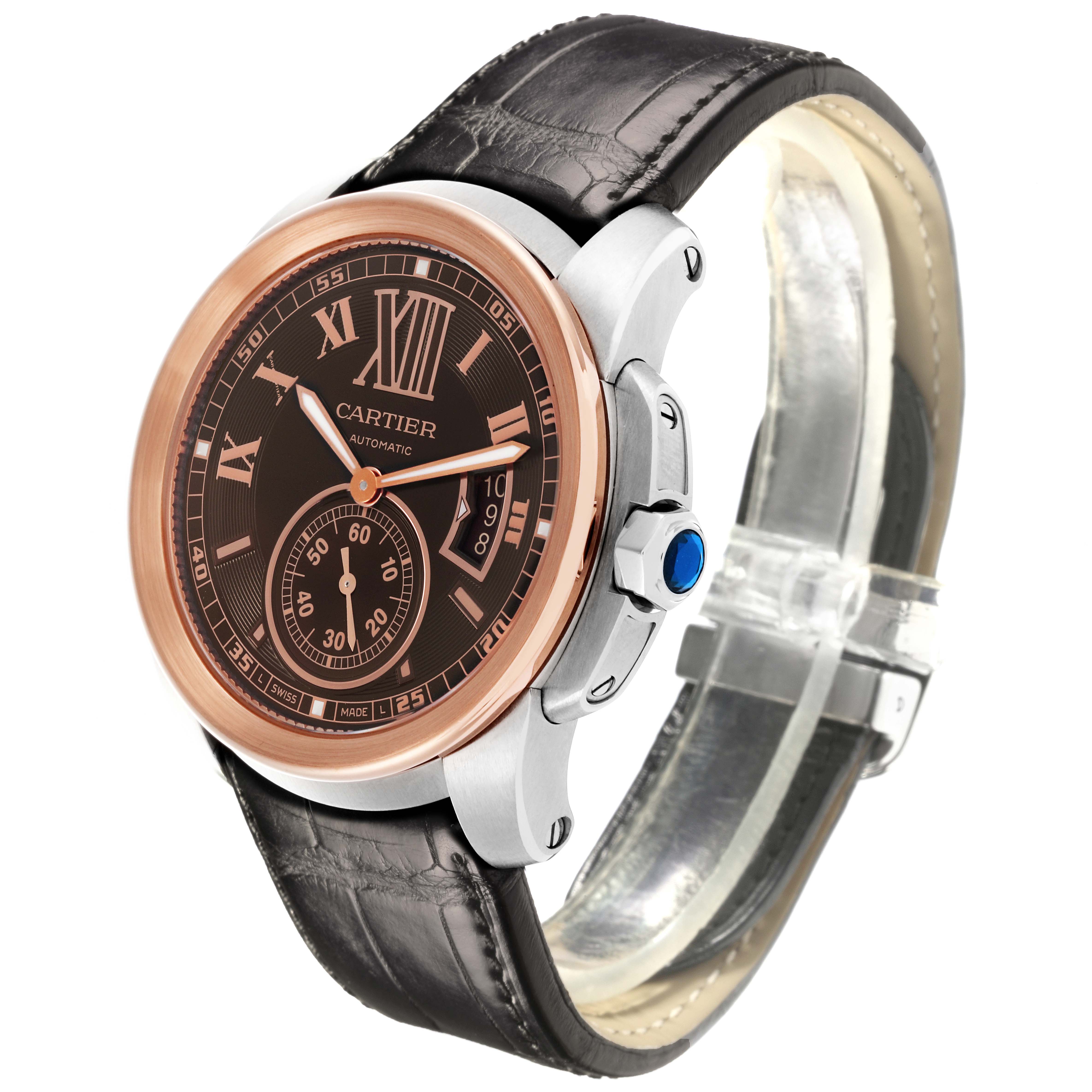 The Calibre de Cartier watch is shown at an angled side view highlighting the dial, crown, case, and strap.