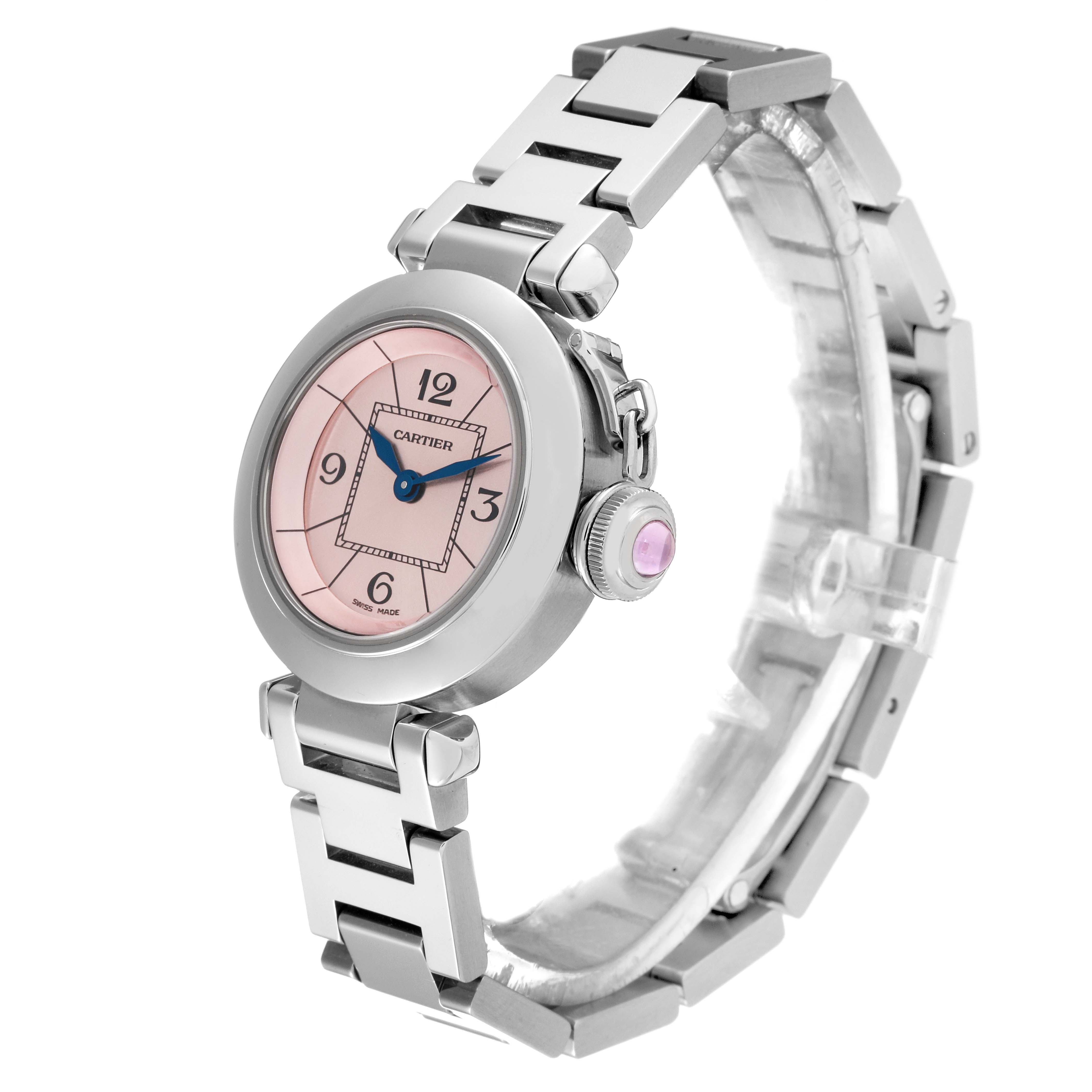 The image displays a Cartier Pasha W3140008 Women's Stainless Steel Pink Dial W3140008 Women's Stainless Steel Pink Dial watch angled to show the face, bezel, bracelet, and crown with a pink cabochon.