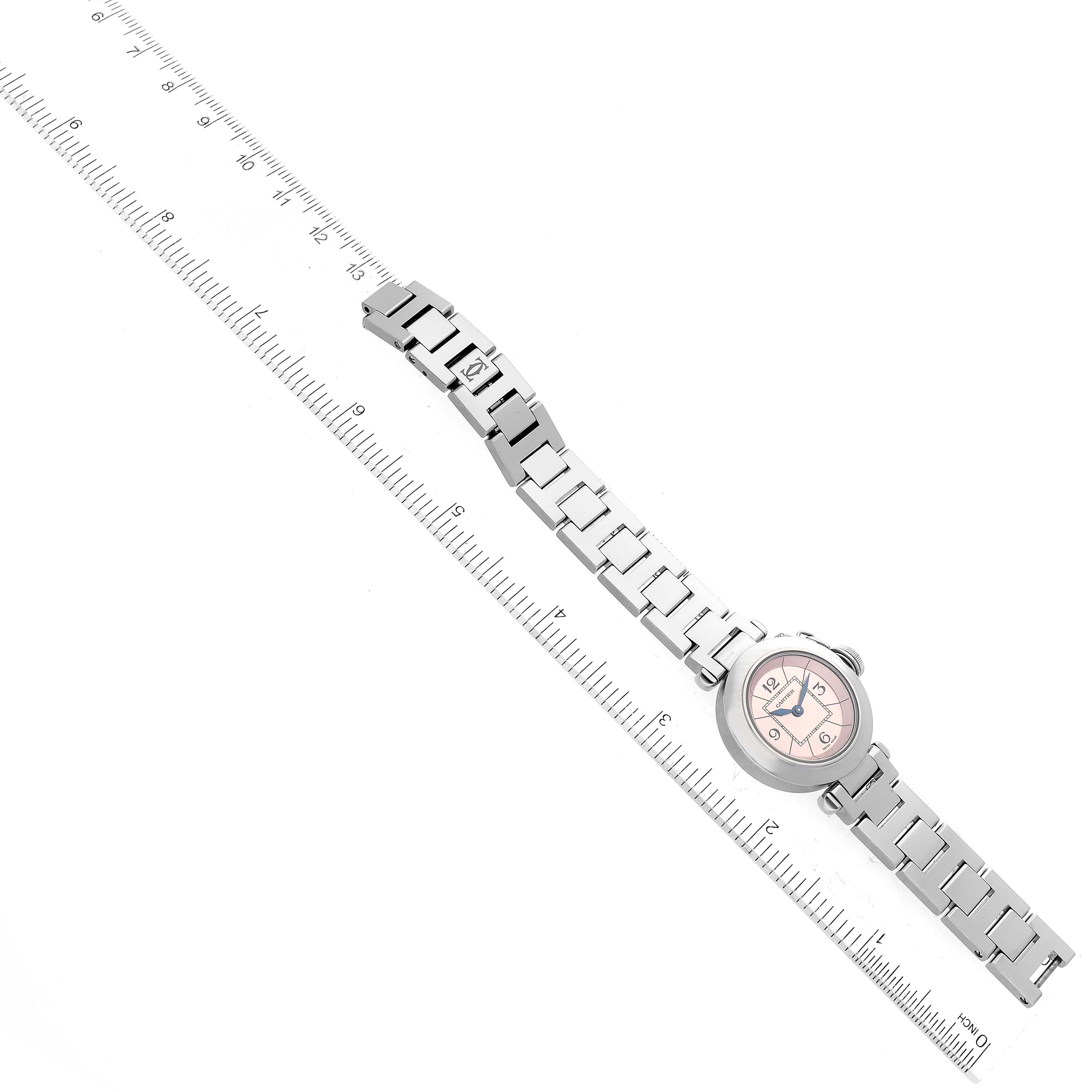 The image shows a Cartier Pasha W3140008 Women's Stainless Steel Pink Dial W3140008 Women's Stainless Steel Pink Dial watch laid flat, with its bracelet aligned next to a ruler for measurement.