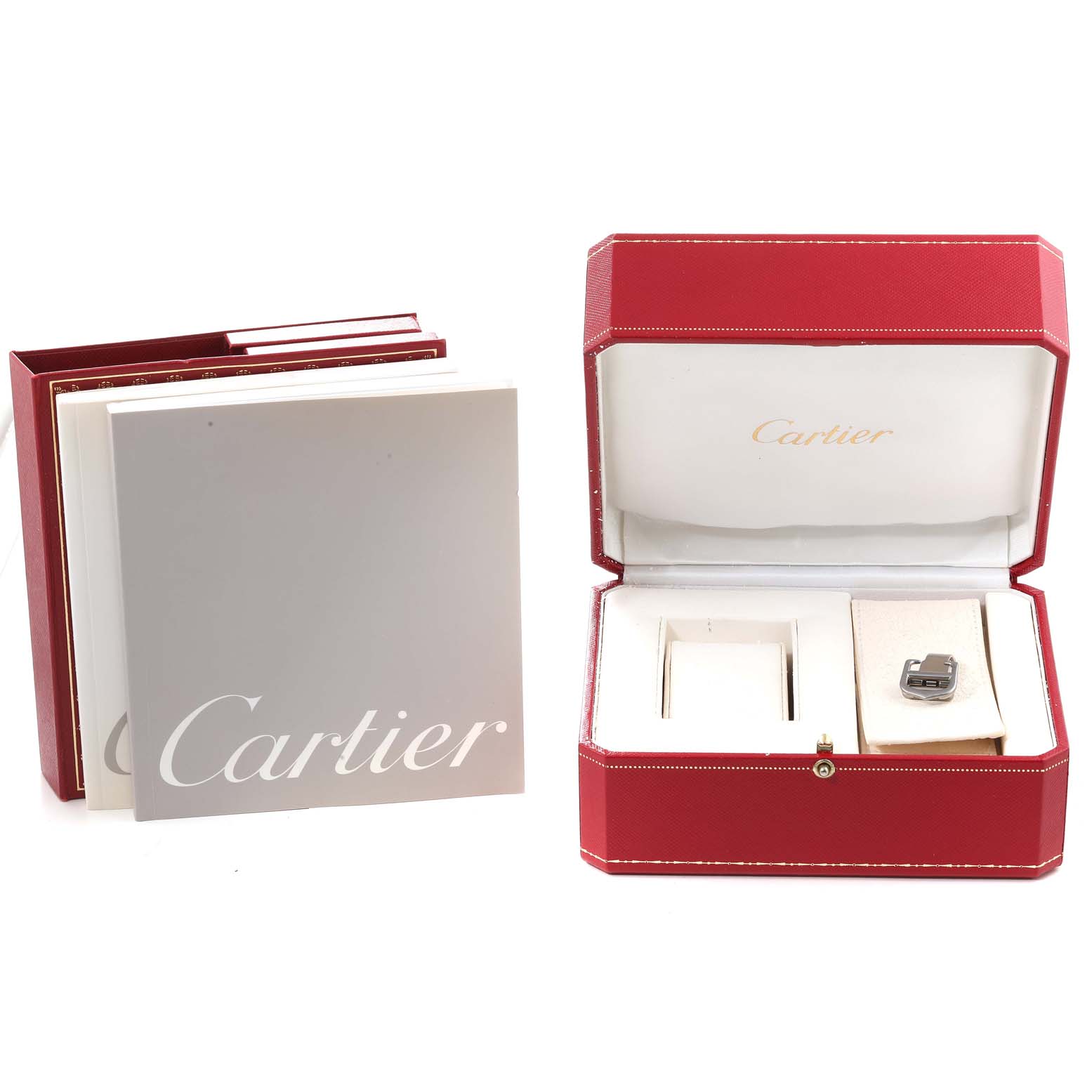 The image shows the accessories for a Cartier Roadster W62016V3 Women
s Stainless Steel Silver Dial W62016V3 Women
s Stainless Steel Silver Dial model, including manuals and a watch case with an additional clasp.
