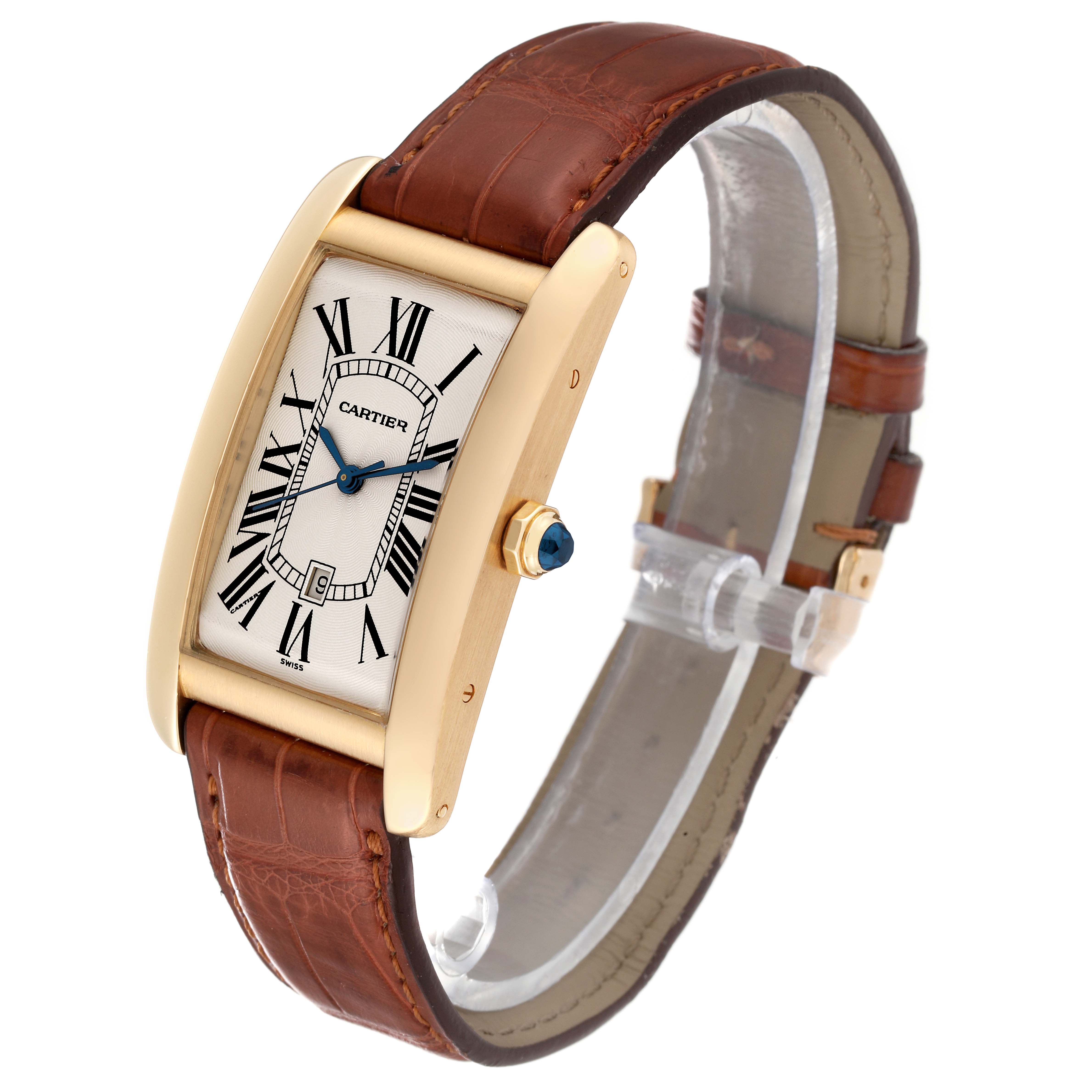 The image shows a Cartier Tank Americaine W2603156 Men's Yellow Gold Silver Dial W2603156 Men's Yellow Gold Silver Dial watch at a slight top-right angle, displaying the face, leather strap, and side crown.