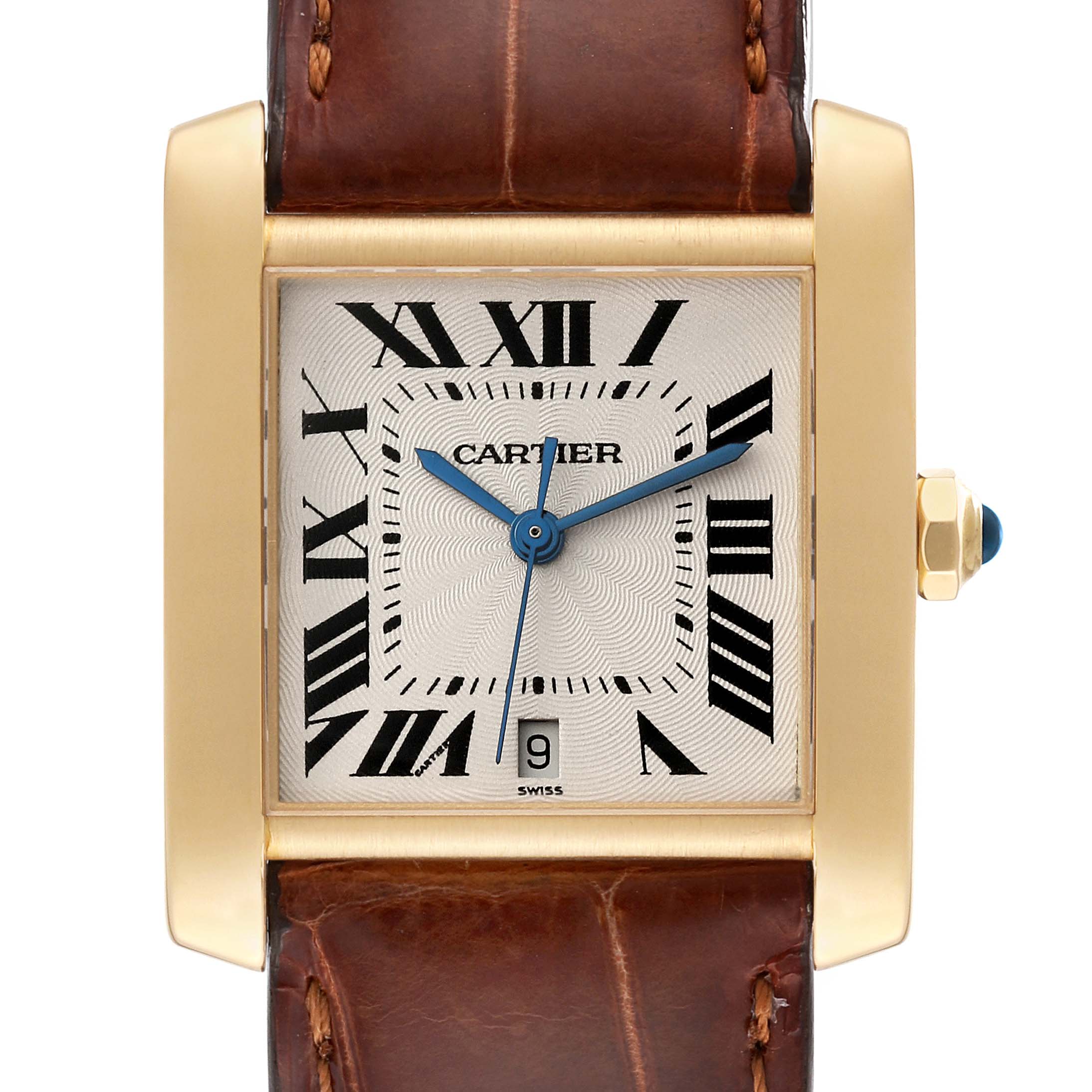The image shows a front view of a Cartier Tank Francaise W5000156 Men
s Yellow Gold Silver Dial W5000156 Men
s Yellow Gold Silver Dial watch with a brown leather strap, gold case, and Roman numeral dial.