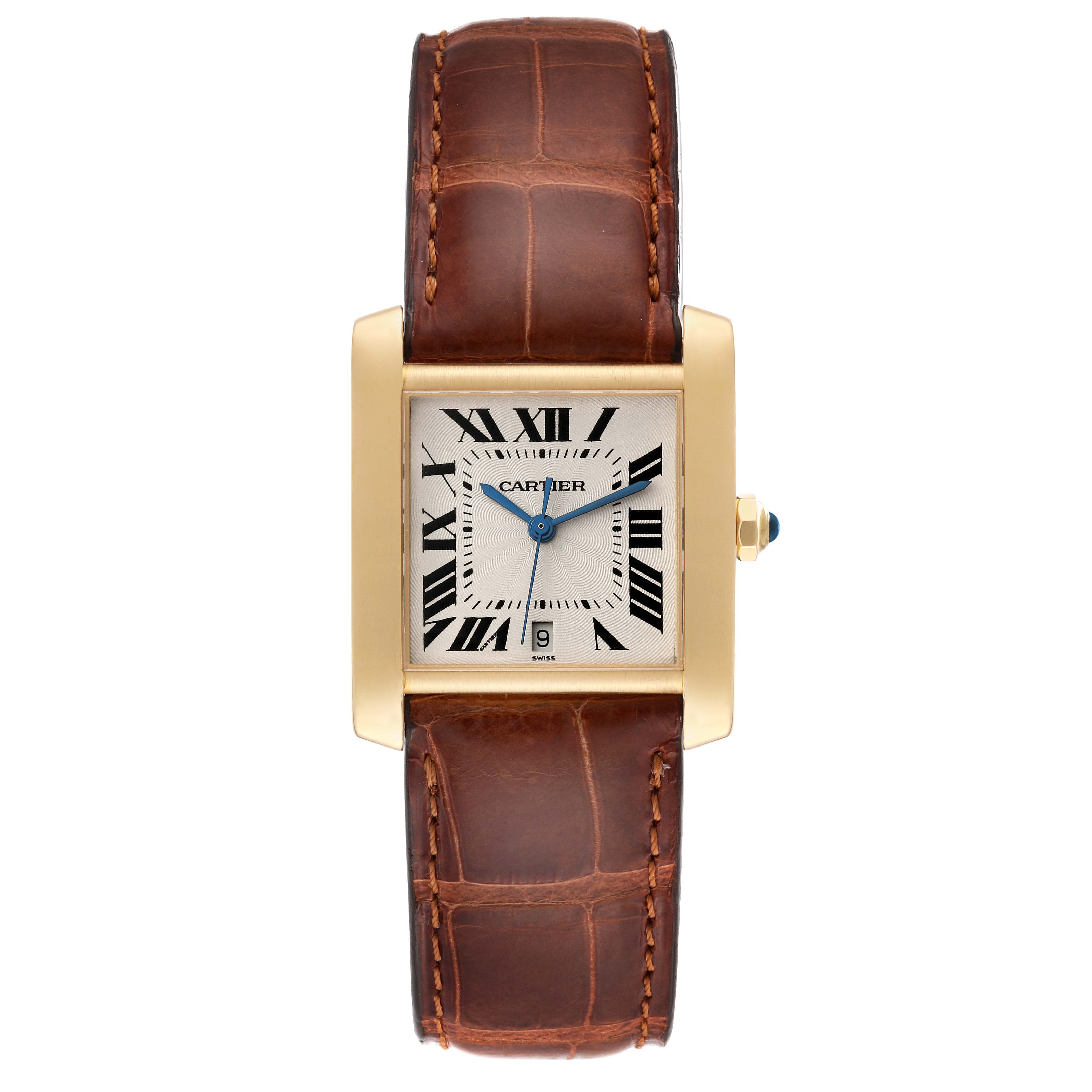 The image shows a front view of a Cartier Tank Française watch featuring a gold case, a brown leather strap, and a rectangular dial with Roman numerals.