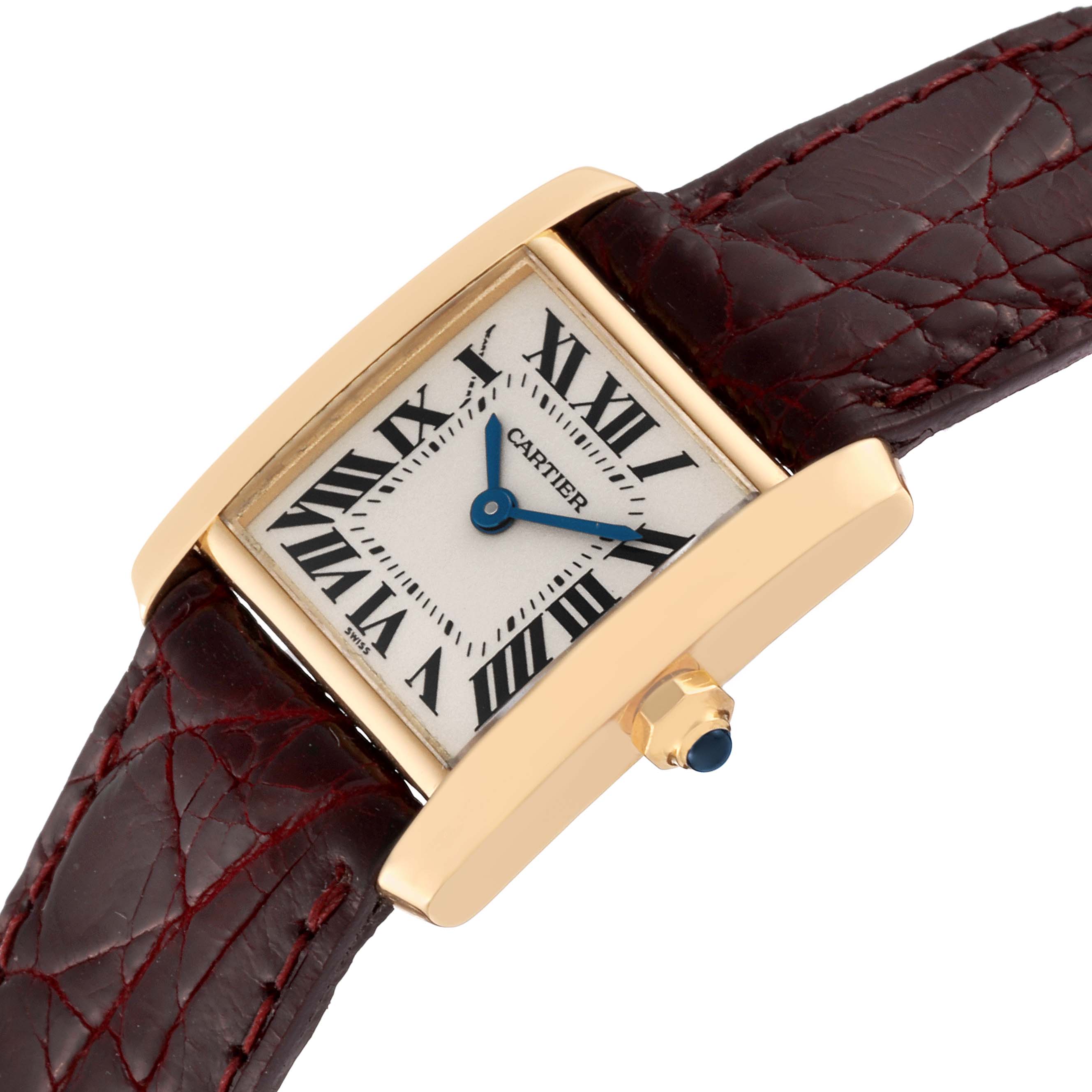 This Cartier Tank Francaise W5000256 Women
s Yellow Gold Silver Dial W5000256 Women
s Yellow Gold Silver Dial watch is shown at a slight angle, highlighting the rectangular dial, Roman numerals, and a portion of the leather strap.